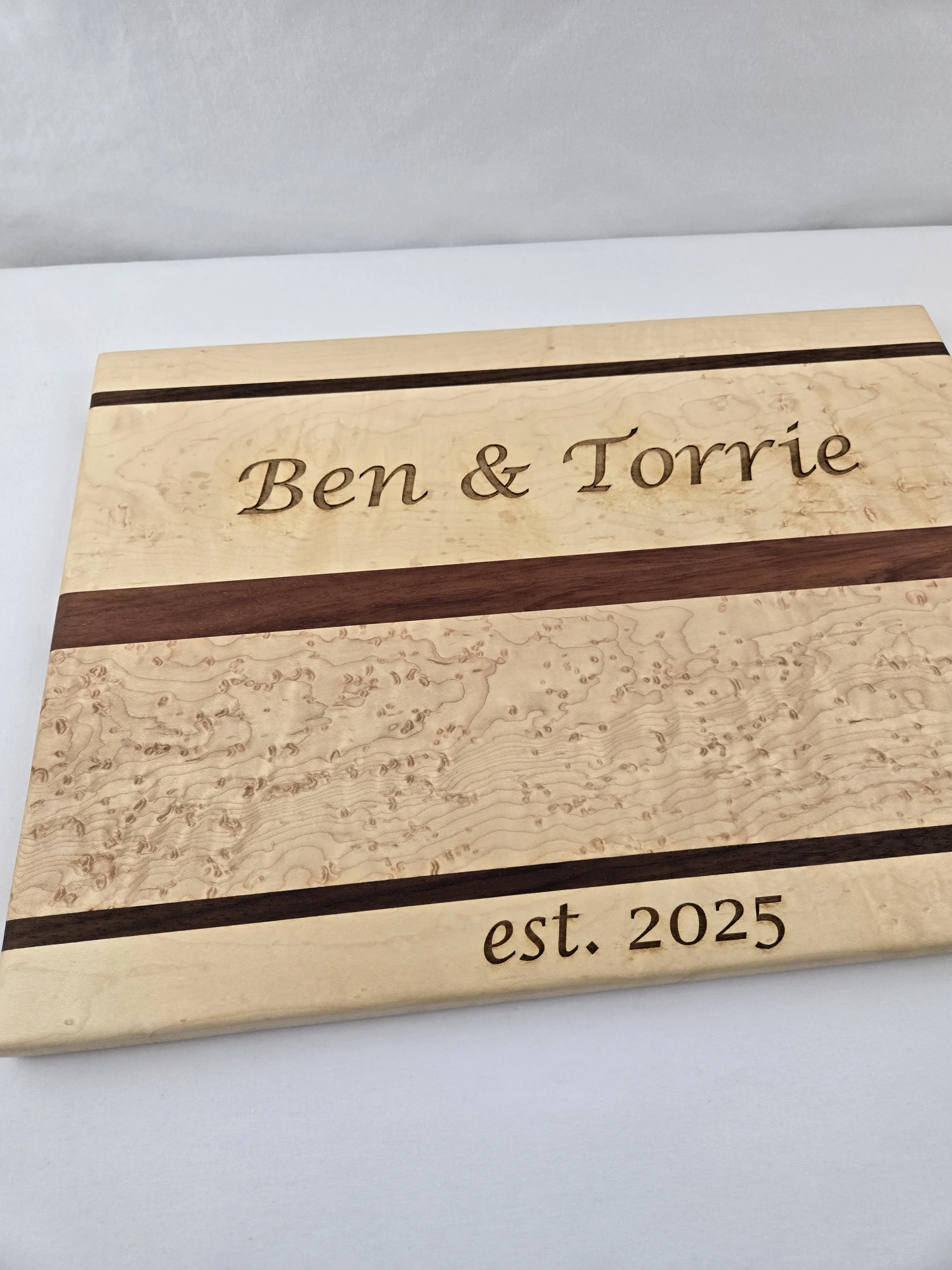 Custom etched cutting board for a housewarming gift.