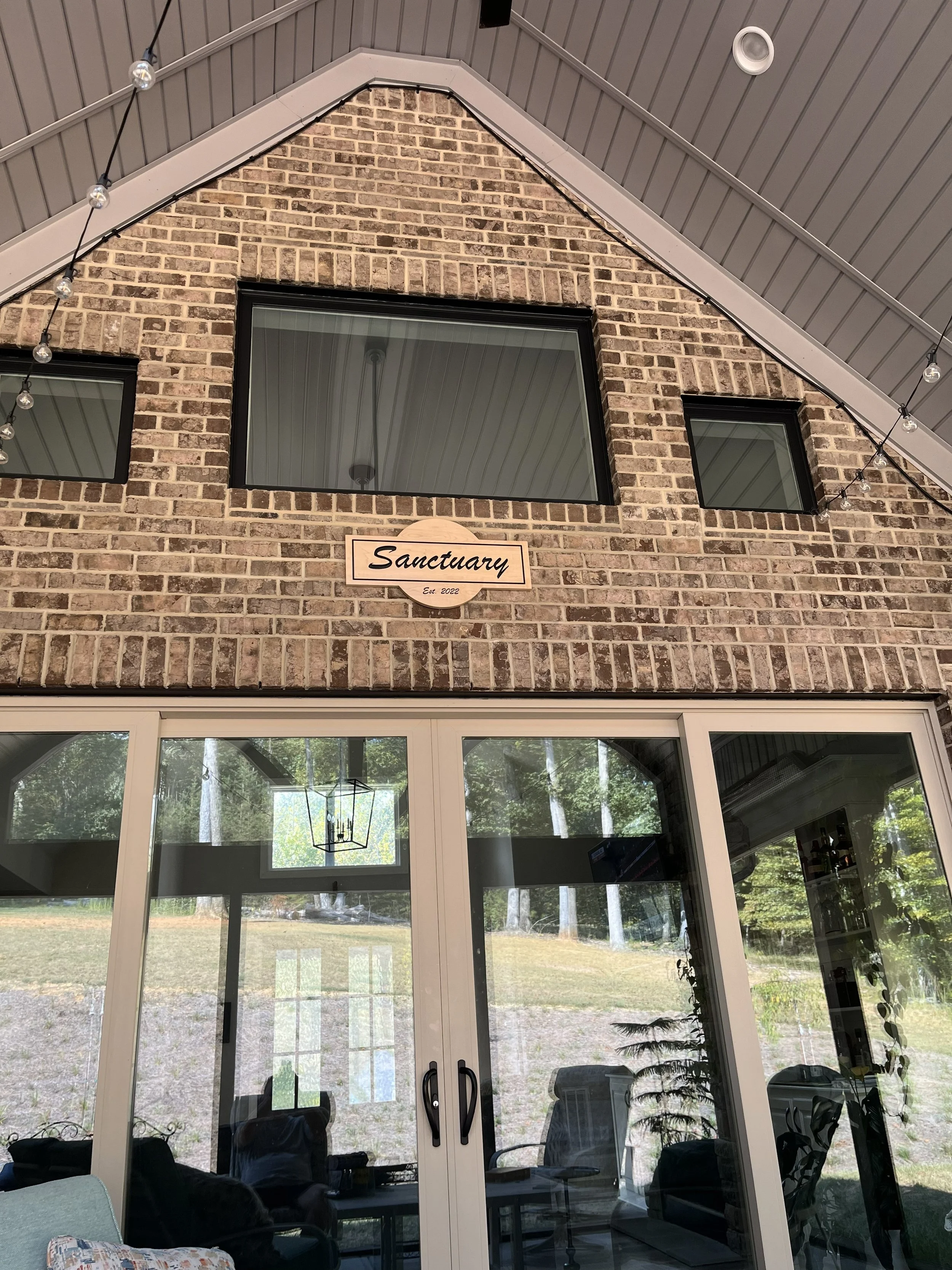 Custom sign in it's new home.