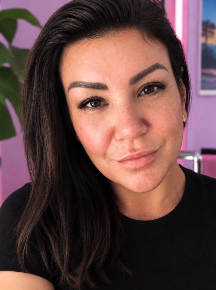 A portrait of a woman with long dark hair