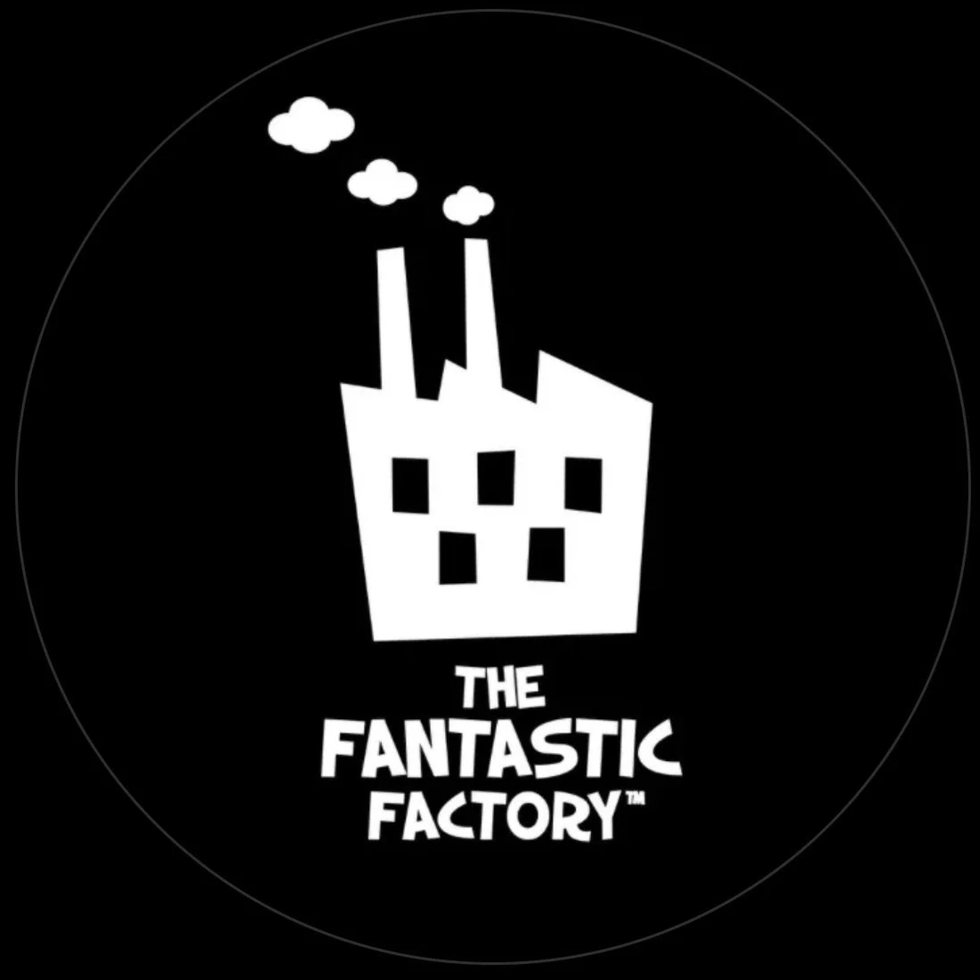 Black background with a white illustration of a factory with smoke coming out of two chimneys. Below the factory, it says 'The Fantastic Factory' in bold letters.