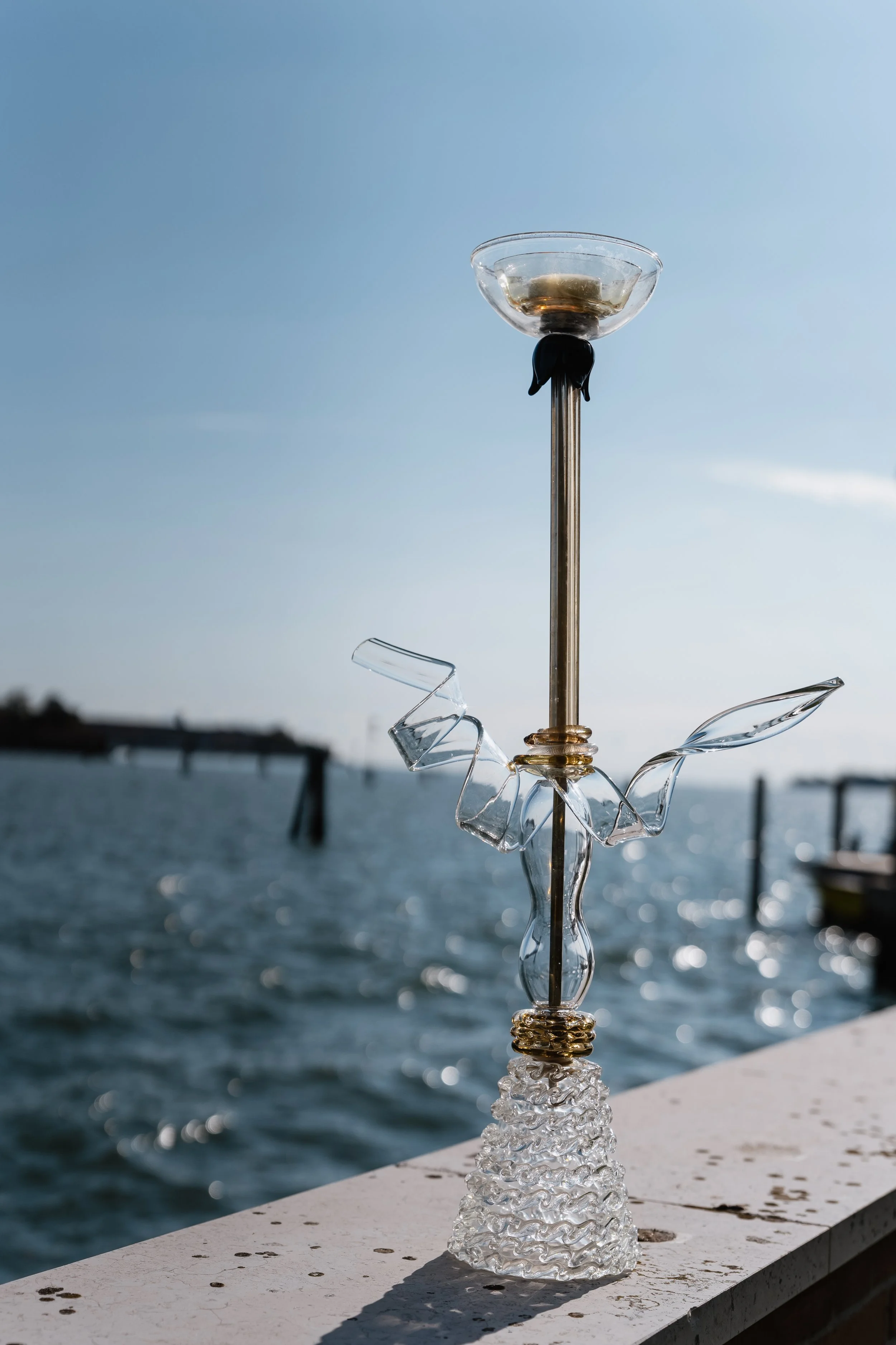 EXTRAVAGRANDE "Caigo" detail, hand-blown Murano glass, a creation by Gianna Alberi, Venice lagoon in background