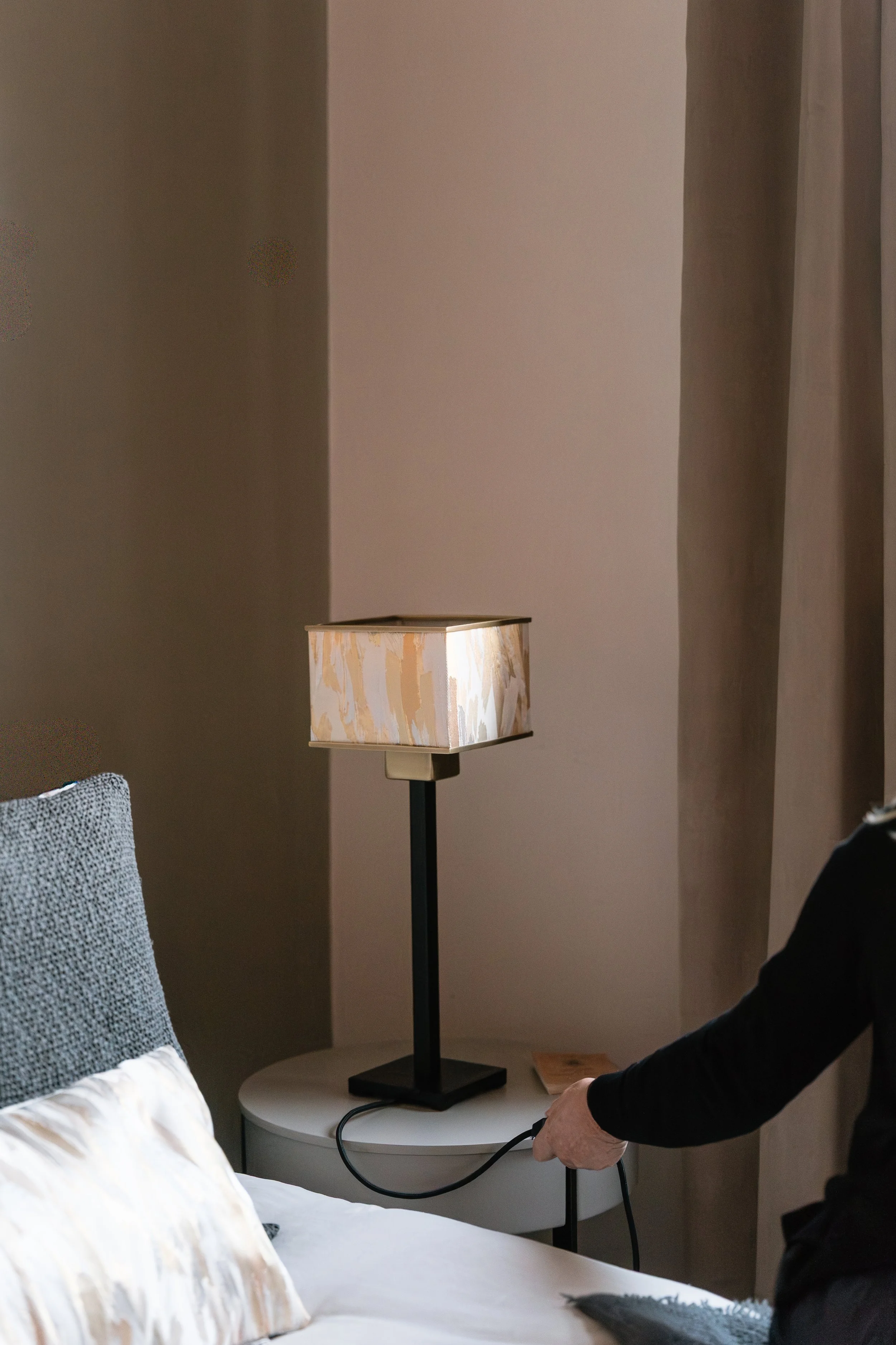 DOGIA Piccola lamp with vintage Japanese Obi textile shade, sculptural base on bedside table
