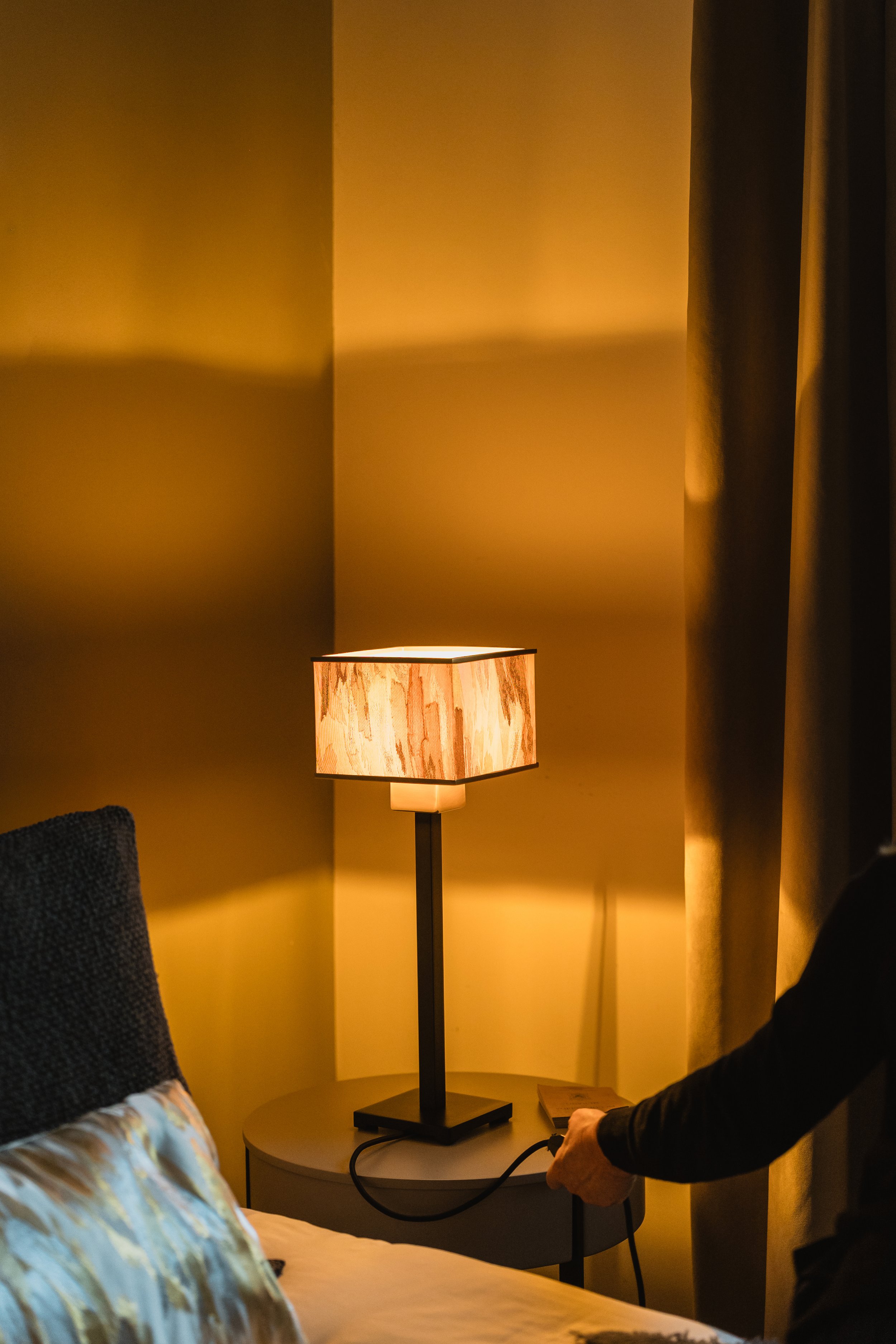 DOGIA Piccola lamp with vintage Japanese Obi textile shade, sculptural base on bedside table
