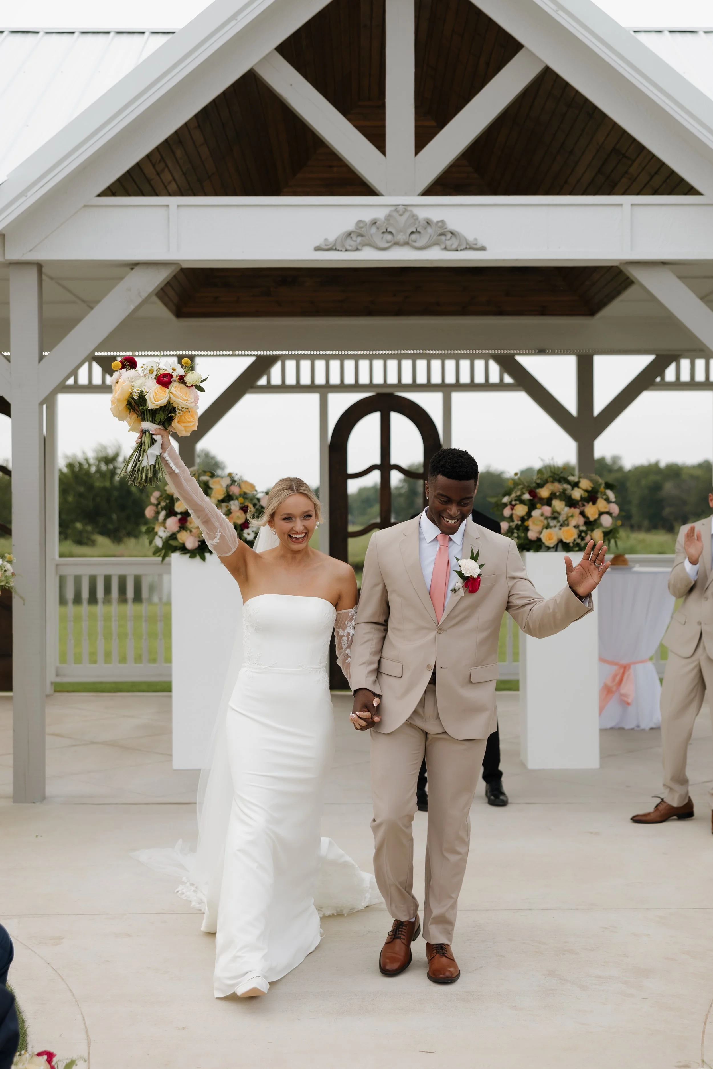 Real couple enjoying their day with Divine Works Event Company, providing professional day-of wedding coordination across Oklahoma.
