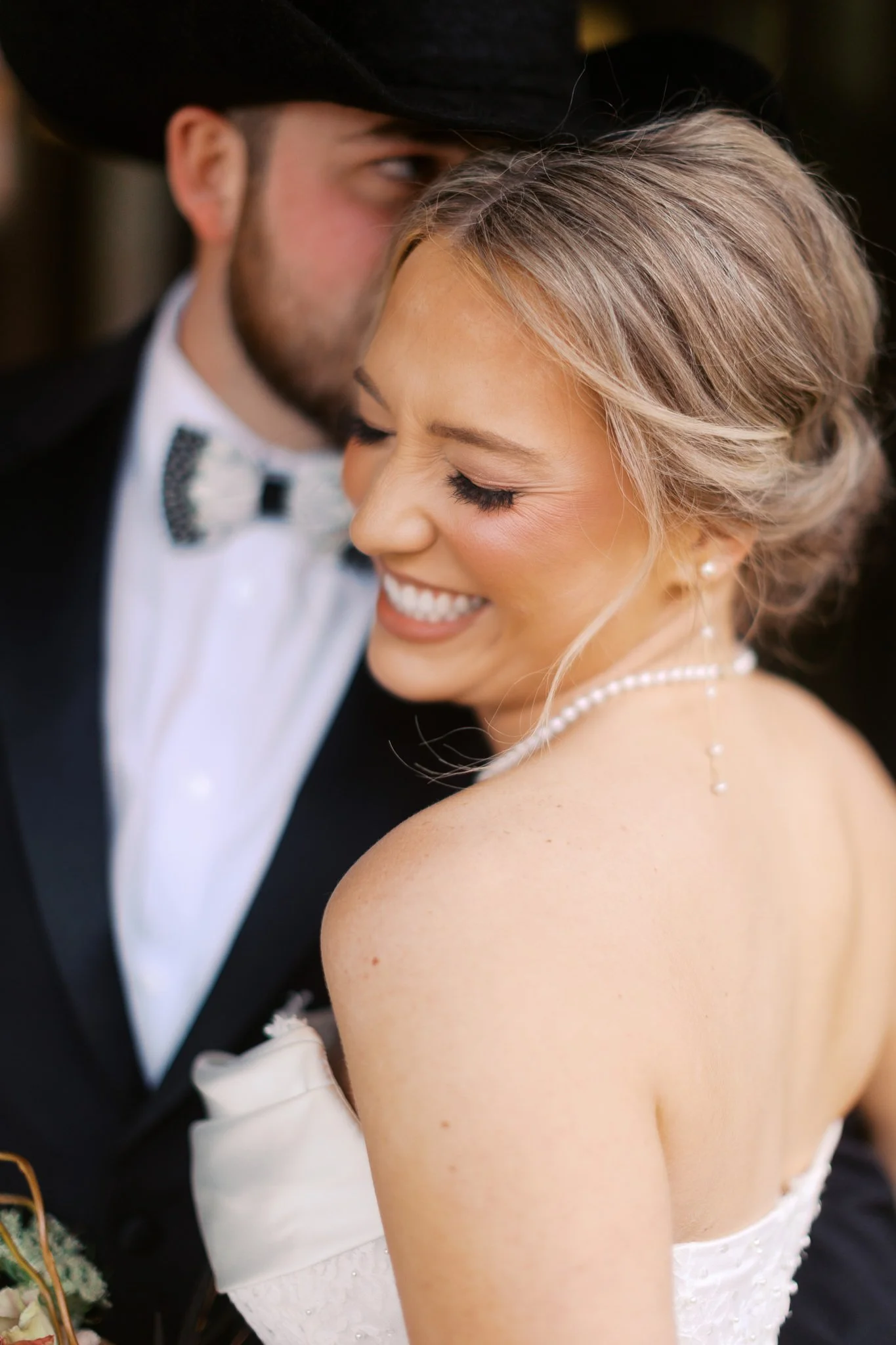 Client review from bride and groom Emma and Trevor after their wedding at Hotel Drover, sharing appreciation for Divine Works Event Company’s organization, attention to detail, and calm, supportive presence throughout the day.
