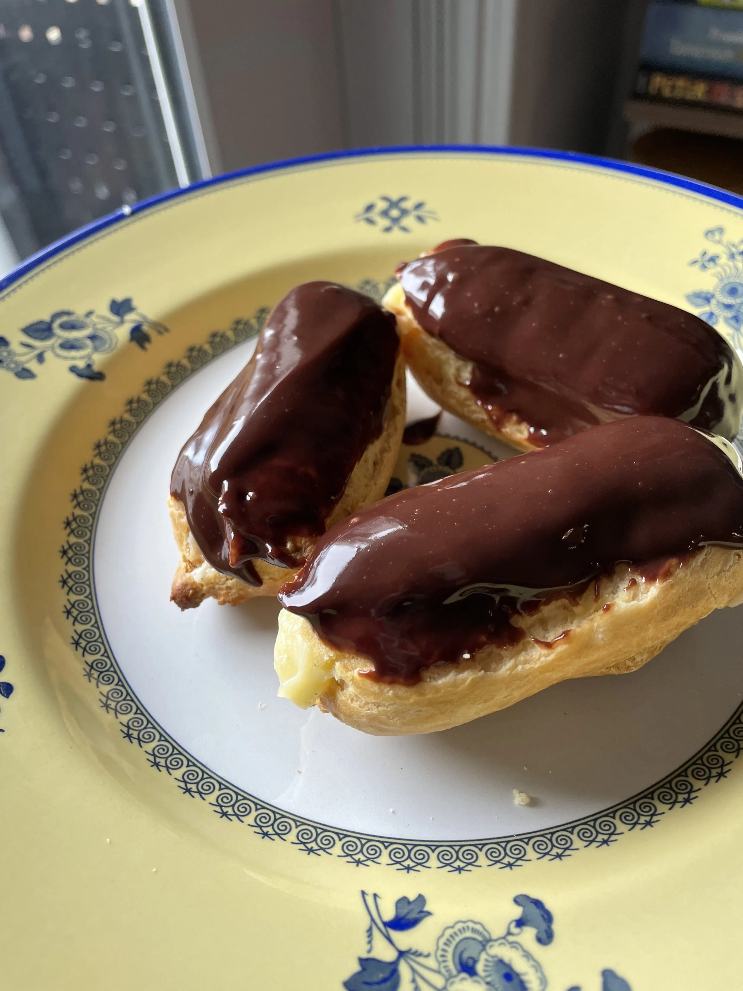 Chocolate eclairs prepared by Boston-based private chef for meal prep.