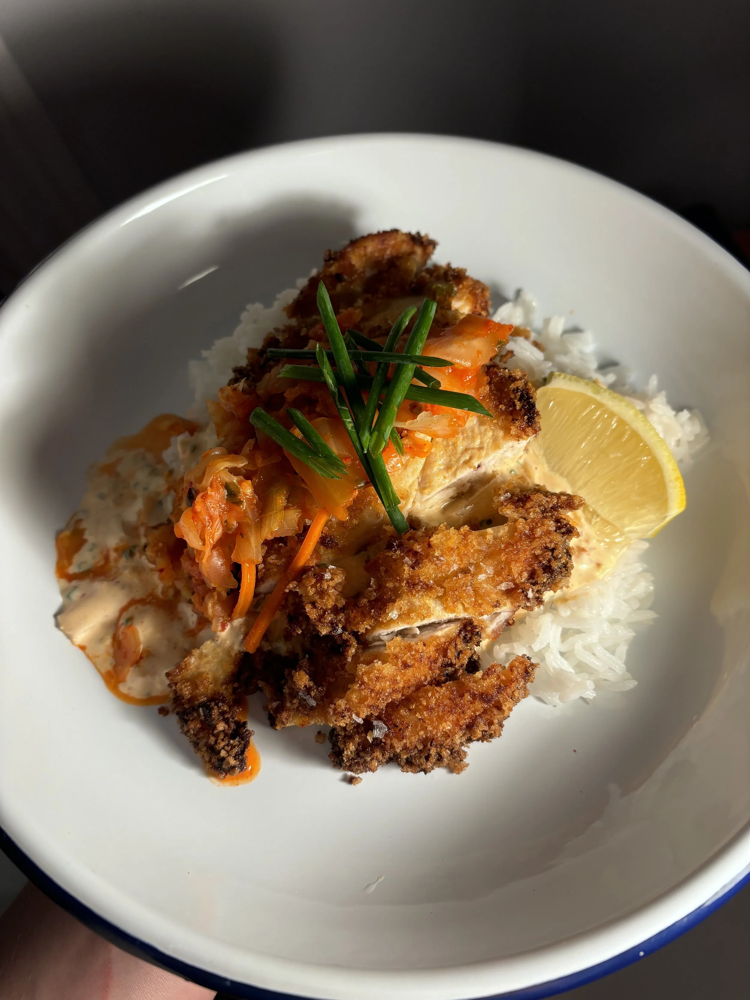 Kimchi ckicken cutlet over rice prepared by Boston-based private chef for meal prep.