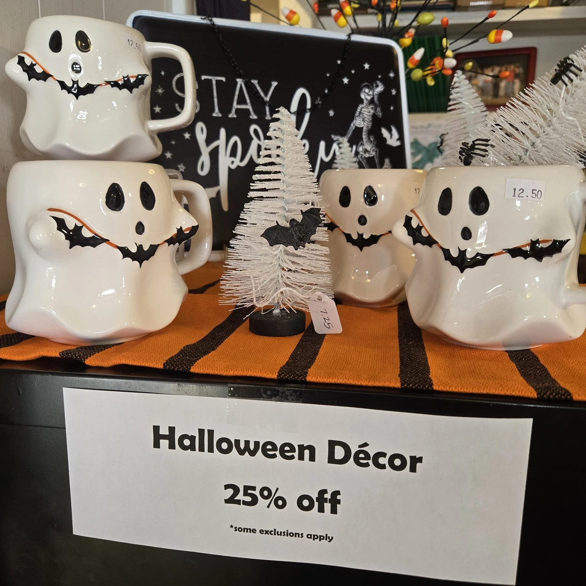 Halloween decor and tea towels are now 25% off!!
