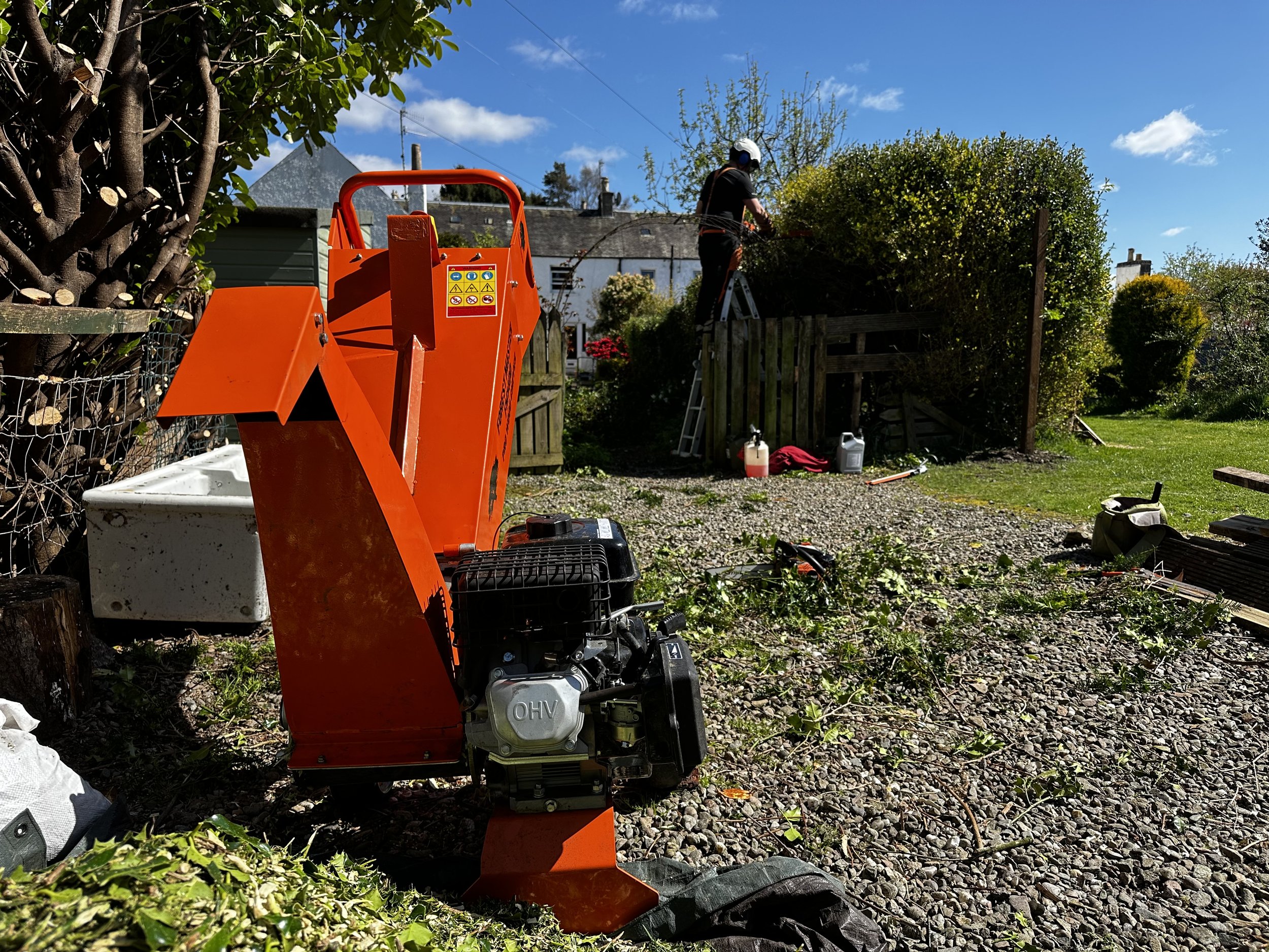Our small but powerful 14hp narrow access wood-chipper is an excellent tool for dealing with trimmings and green waste. There is no garden we have worked in yet that we can't get this tool into! If we can chip into your compost pile, or green bin, w