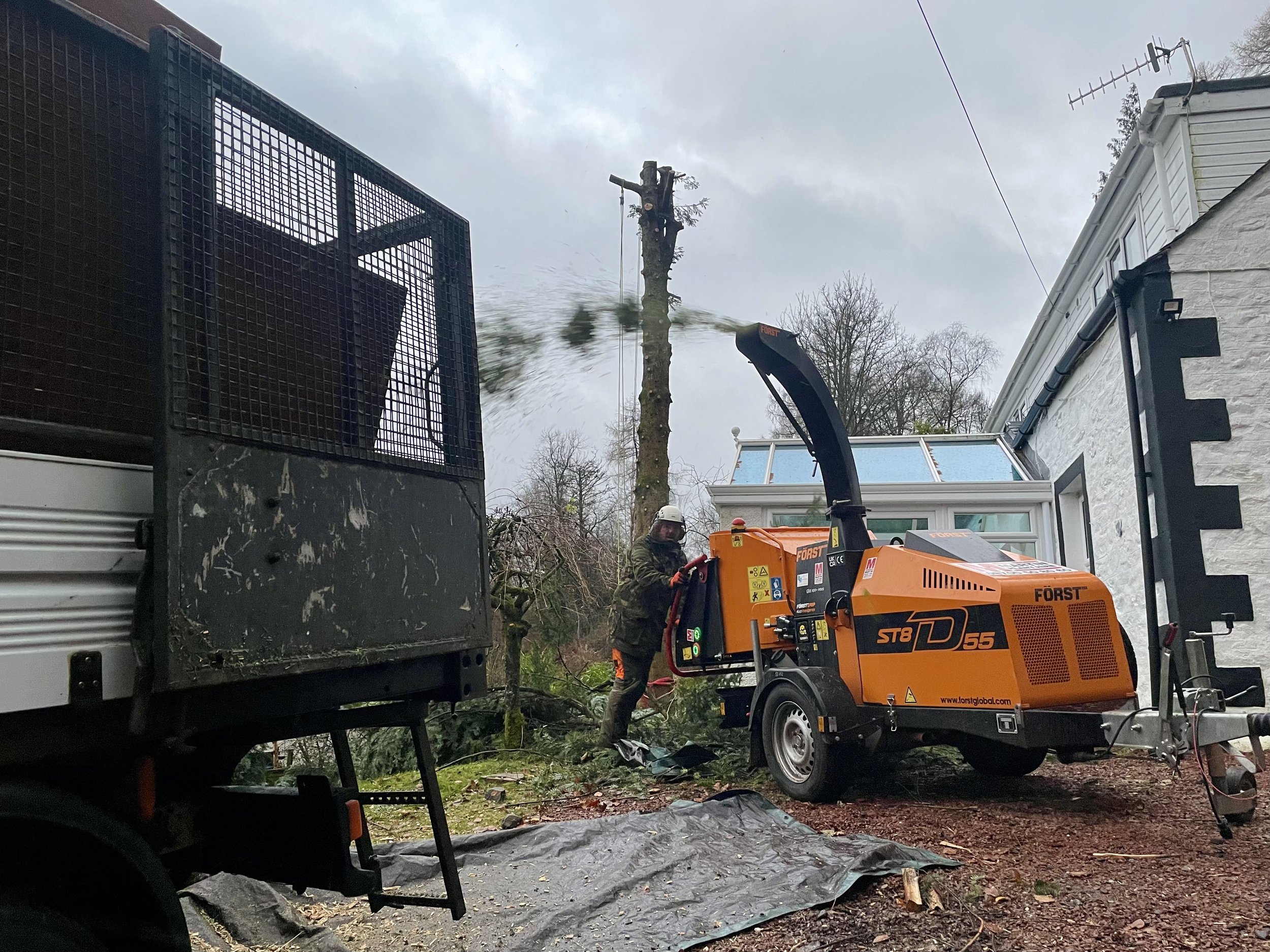 Large dismantles produce a lot of branches! We definitely needed a large wood-chipper for this Noble Fir dismantle in Lochearnhead, Stirlingshire. We are very fortunate to have several contacts who are able to source just about any larger plant we ne
