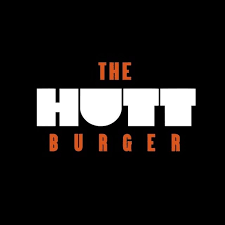Logotipo do The Hutt Burger, com o nome em letras brancas e laranja em fundo preto.