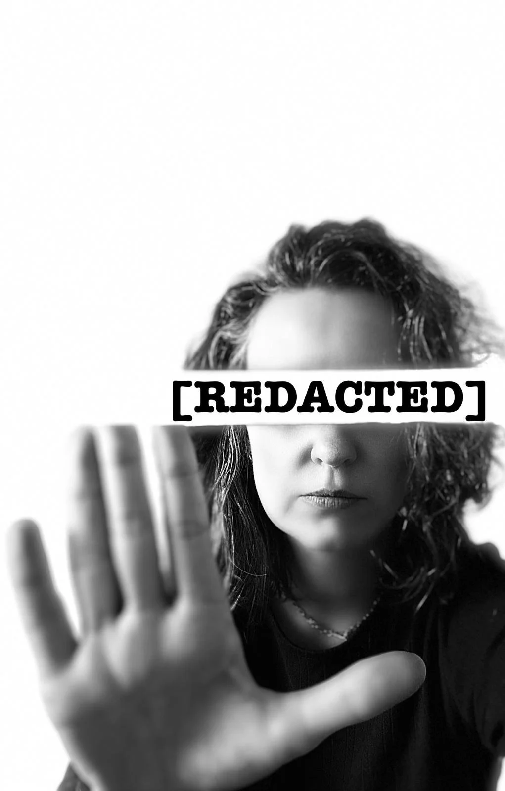 Black and white photo of a woman with shoulder-length hair holding her hand up towards the camera. A bold label in the middle of the image says '[REDACTED]'.