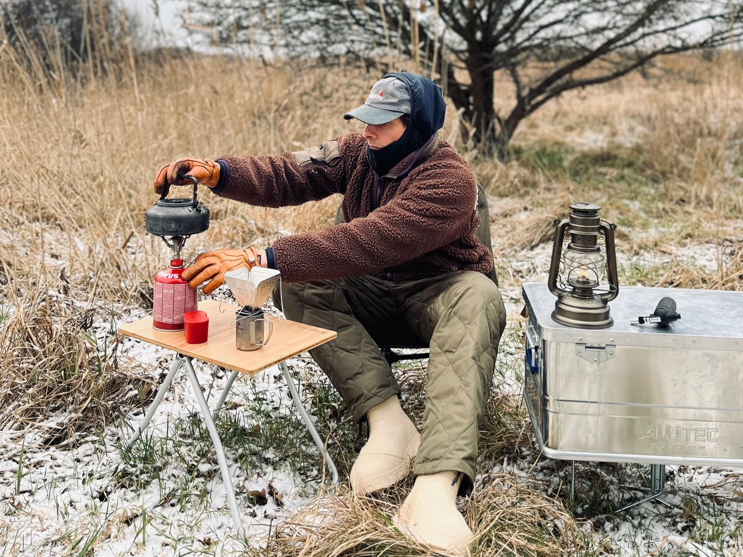 Man camping in winter