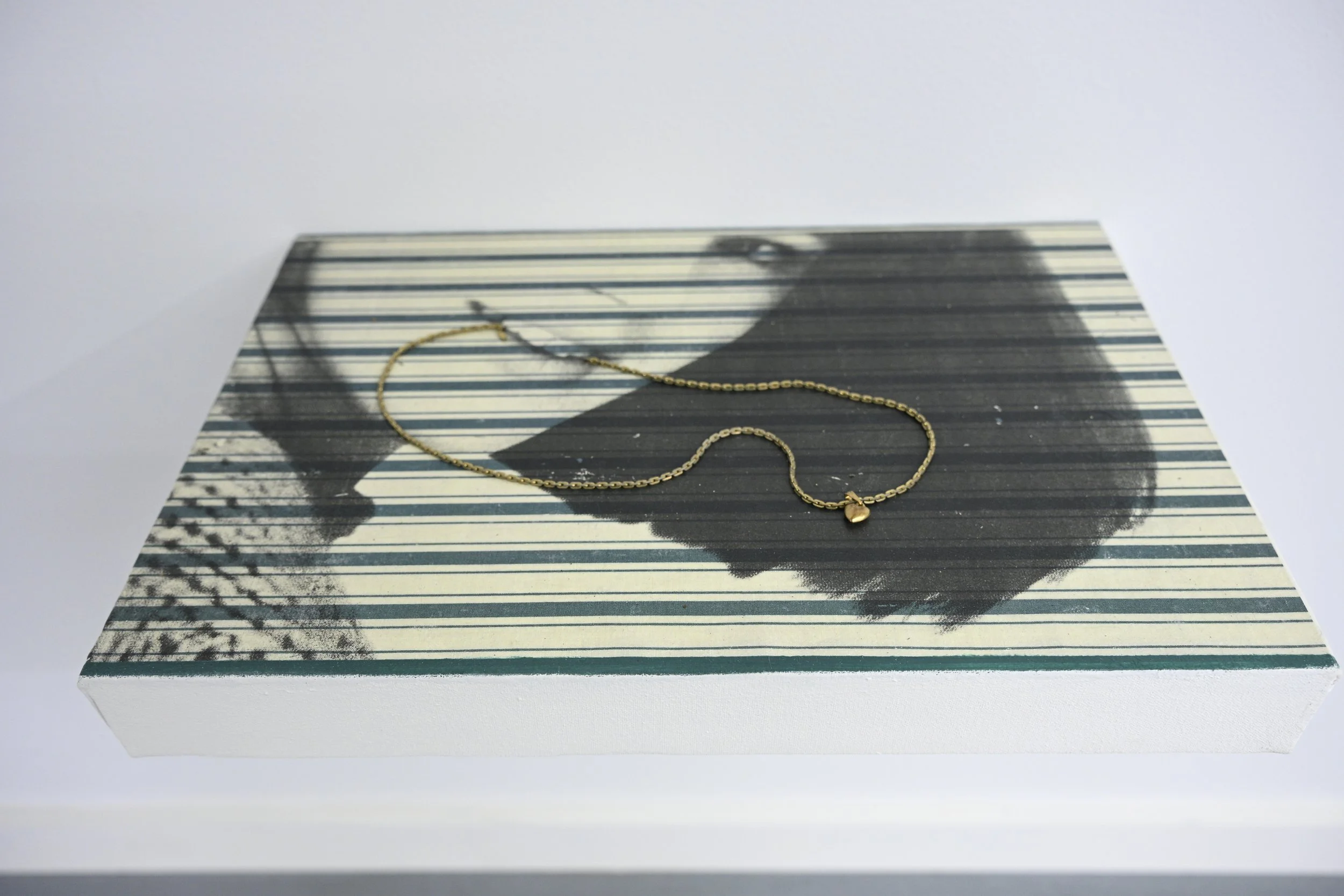 Golden Tongue / 2026 / acrylic transfers, vintage necklace, thread on canvas / 11 1/8” x 16 7/8" / $1200