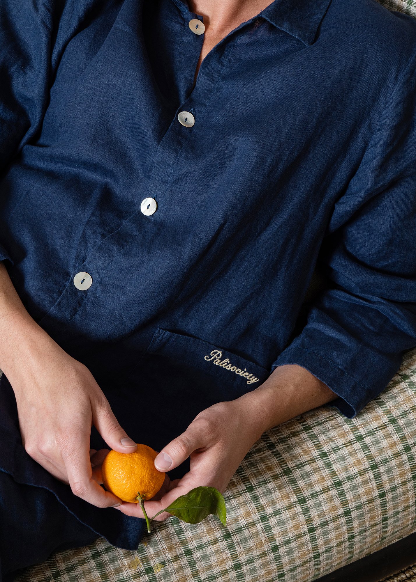 Detail of fabric and buttons on Palisociety Navy Linen Pajamas
