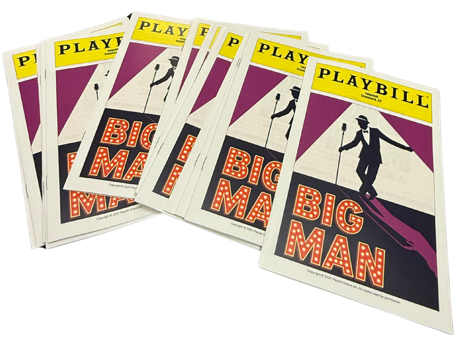 Multiple copies of the Playbill for the musical Big The Musical, featuring a silhouette of a man in a tuxedo and bowtie on a stage with a purple and white background.