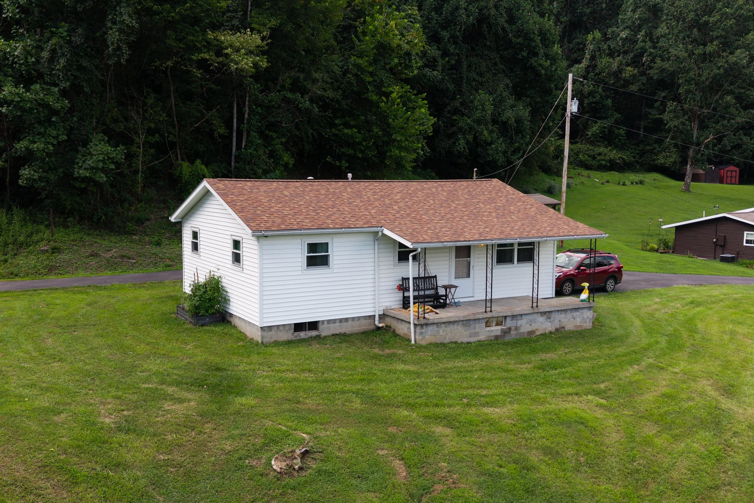  Hero drone photo of a single-family home in Morgantown, WV. Perfect image for an MLS-ready gallery.  
