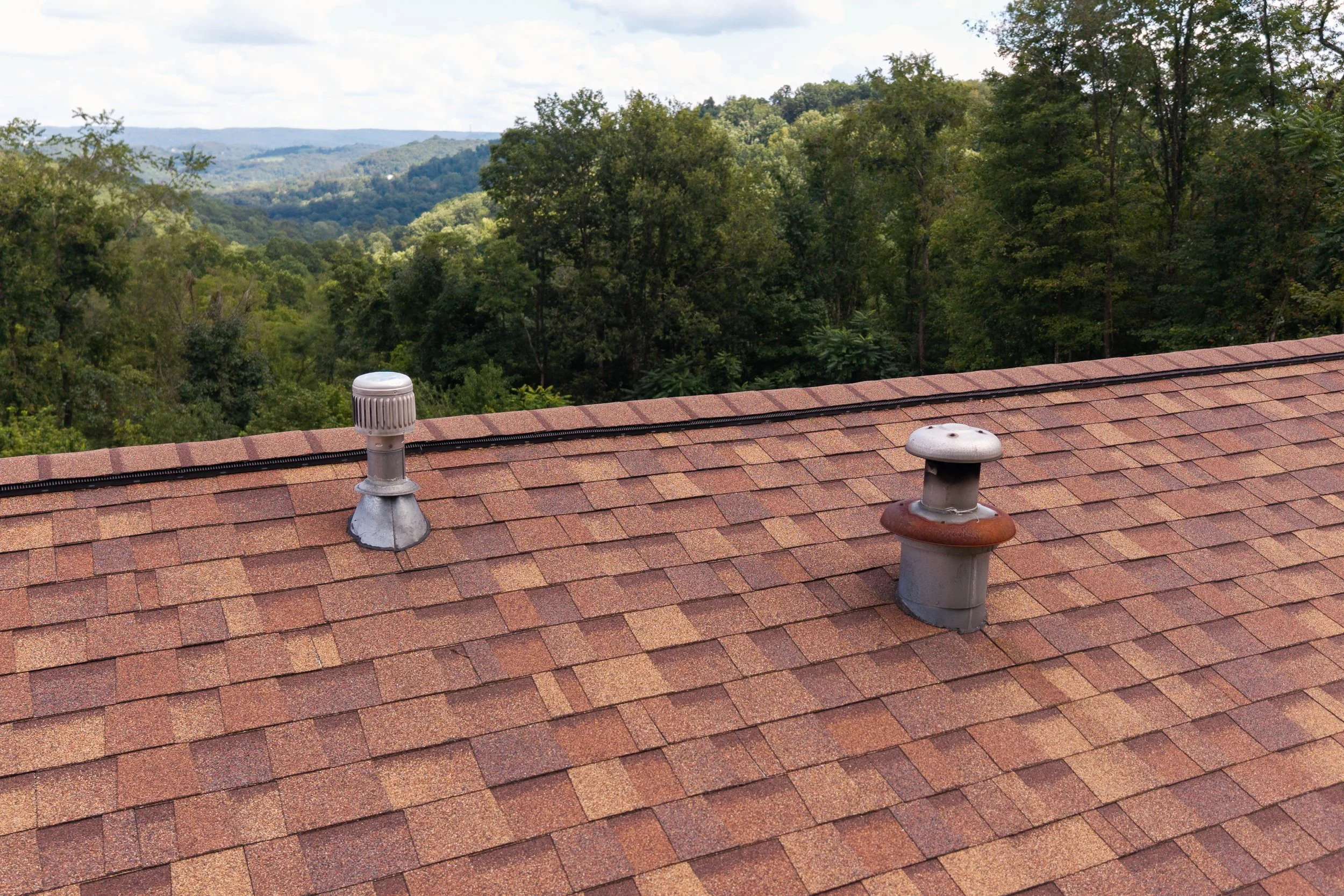  Drone images of vents on a newly installed roof in Morgantown, WV. 