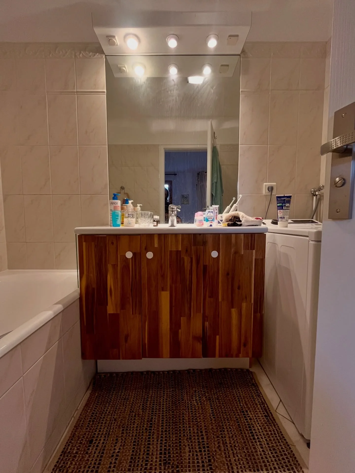 For this renovation, I made custom cabinet doors to bring warmth and structure to a very standard bathroom unit.

Same base.
Better proportions.
A completely different feel.

Sometimes, that&rsquo;s all it takes