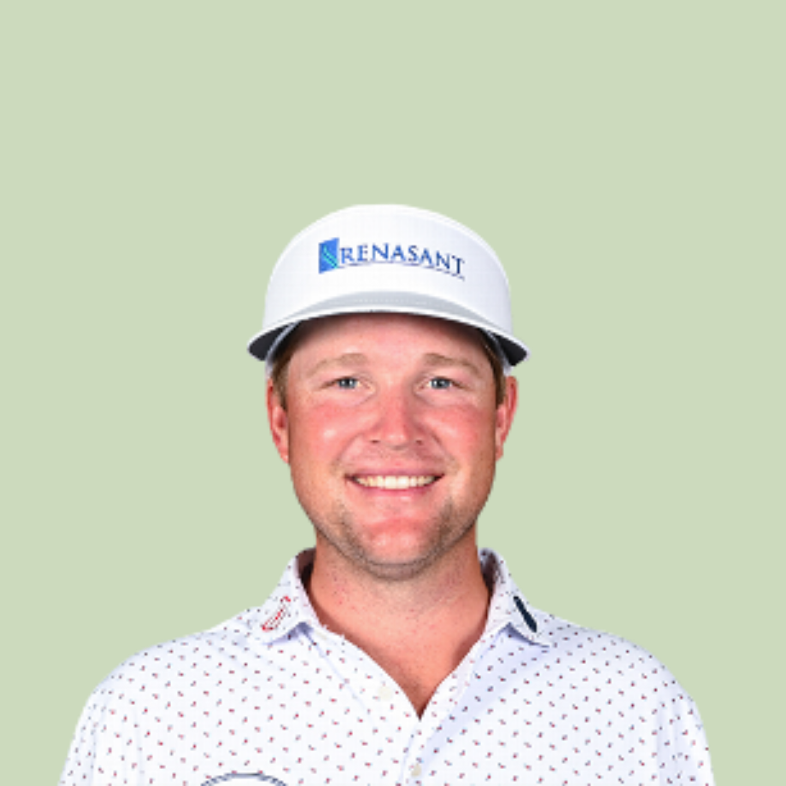 A person wearing a white cap with the logo 'Resan' and a white shirt with red and black polka dots, smiling against a light green background.