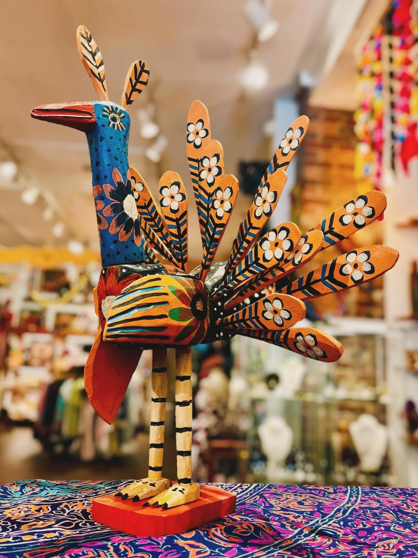 Brilliantly carved, lovingly painted- this handcrafted Guatemalan peacock is a true celebration of folk art&rsquo;s beauty and spirit. 🦚✨#guatemalanfolkart #handcraftedtreasures #folkartbeauty #peacockart #artfromguatemala #handpaintedmagic #folkart
