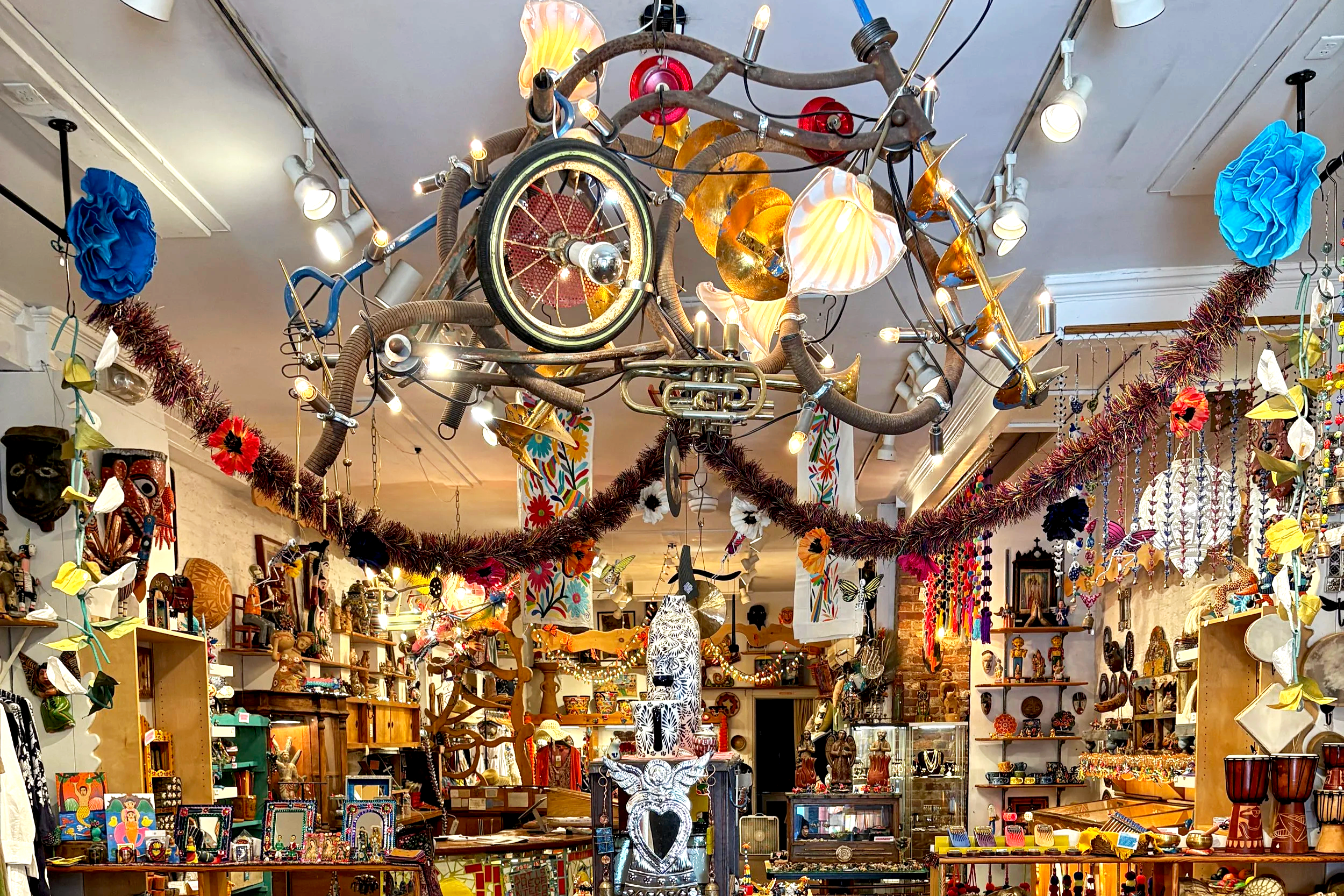 Interior of Eye's Gallery on South Street in Philadelphia. Decorated with colorful and eclectic items, including Latin American Folk Art, clothing, jewelry, and treasures from around the world!