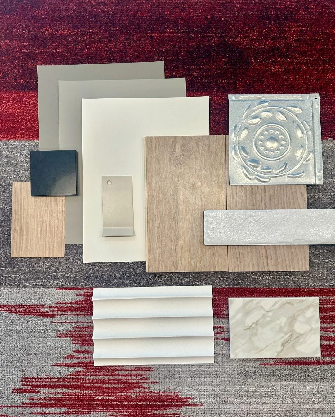 🎨Finish Palette Spotlight 🎨
For a recent project, we curated a palette of upscale neutrals layered with texture and depth. Warm woods, soft metallics, and timeless stone created a refined foundation, while the brand&rsquo;s signature red was woven 