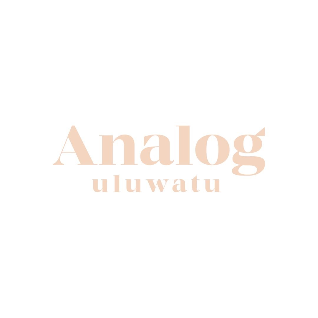 "Analog uluwatu" text in beige color on white background
