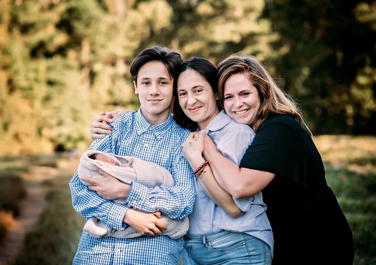 A photo of our president with a happy family.