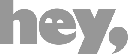 Texto con la palabra "hey," en letras grandes y grises.