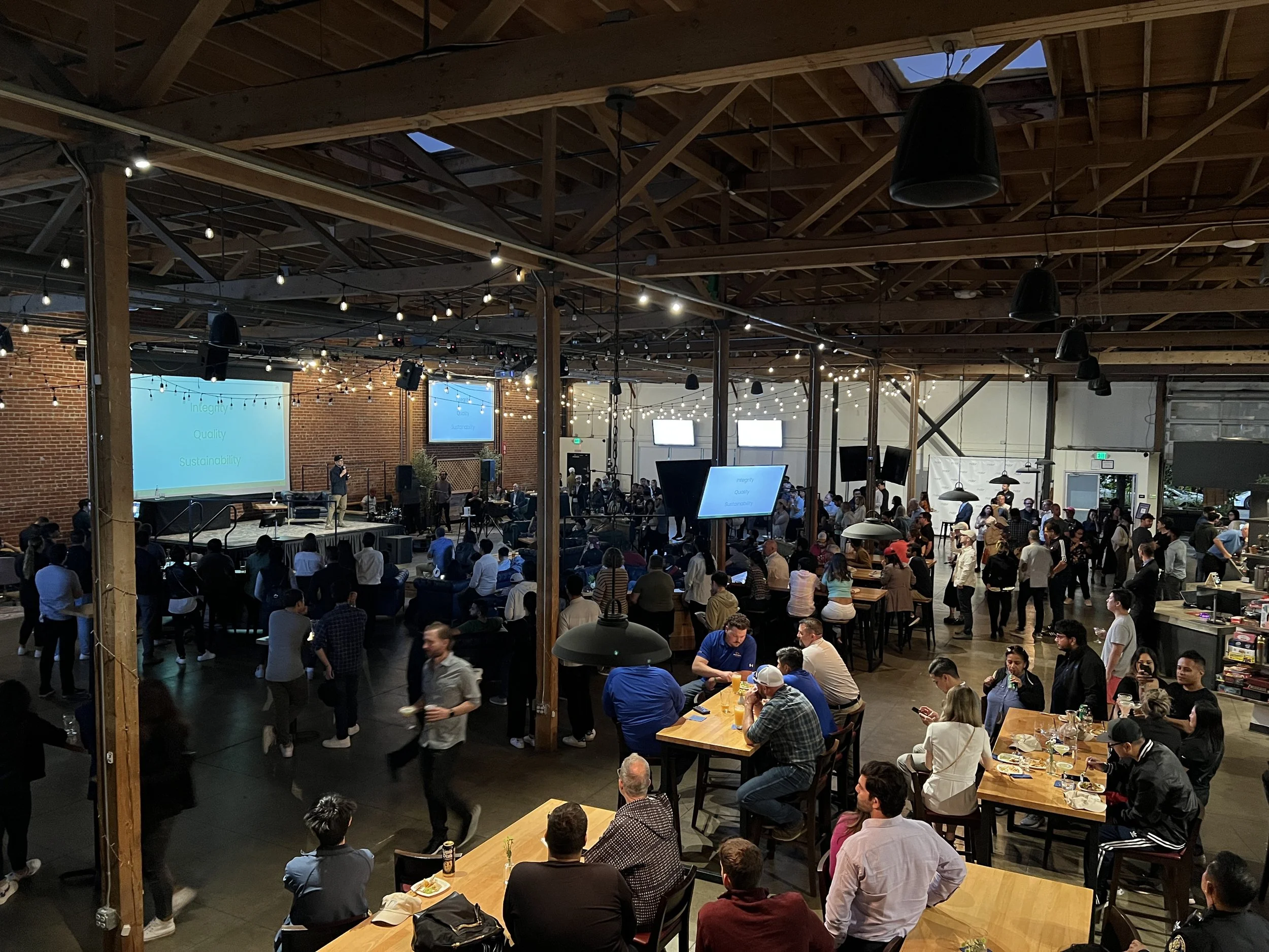 Presenation given during corporate event in front of large room of attendees