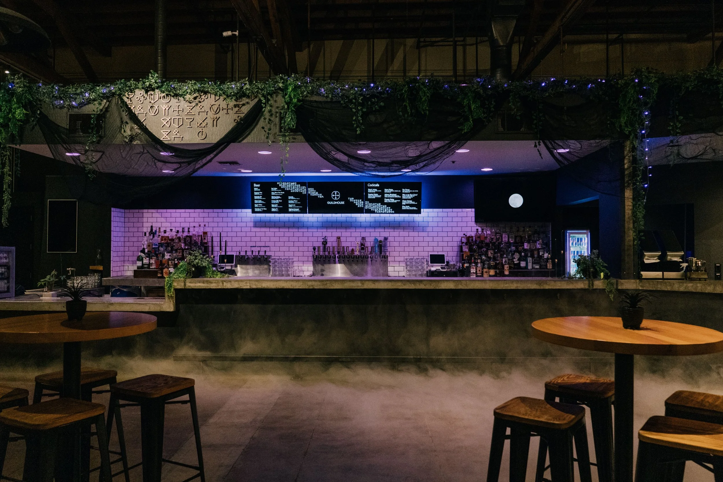 Custom bar decor for corporate Halloween event at Guildhouse