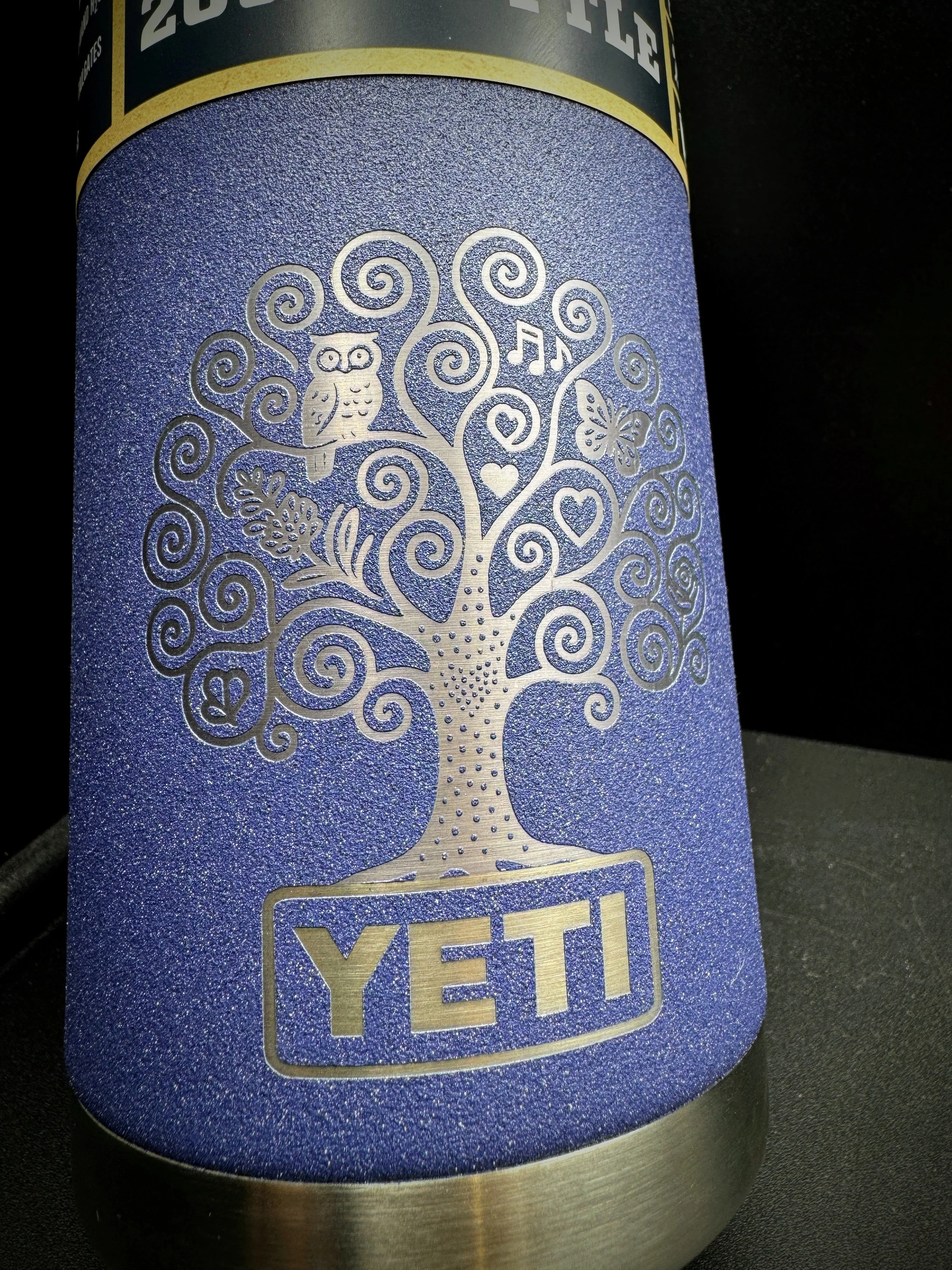 Four personalized Yeti tumblers in different colors: white, pink, red, and mint green, each with a name engraved on it: Suz, Anne, Kate, and Penny. The logo "Adelaide Laser Engraving" is visible in the bottom left corner.