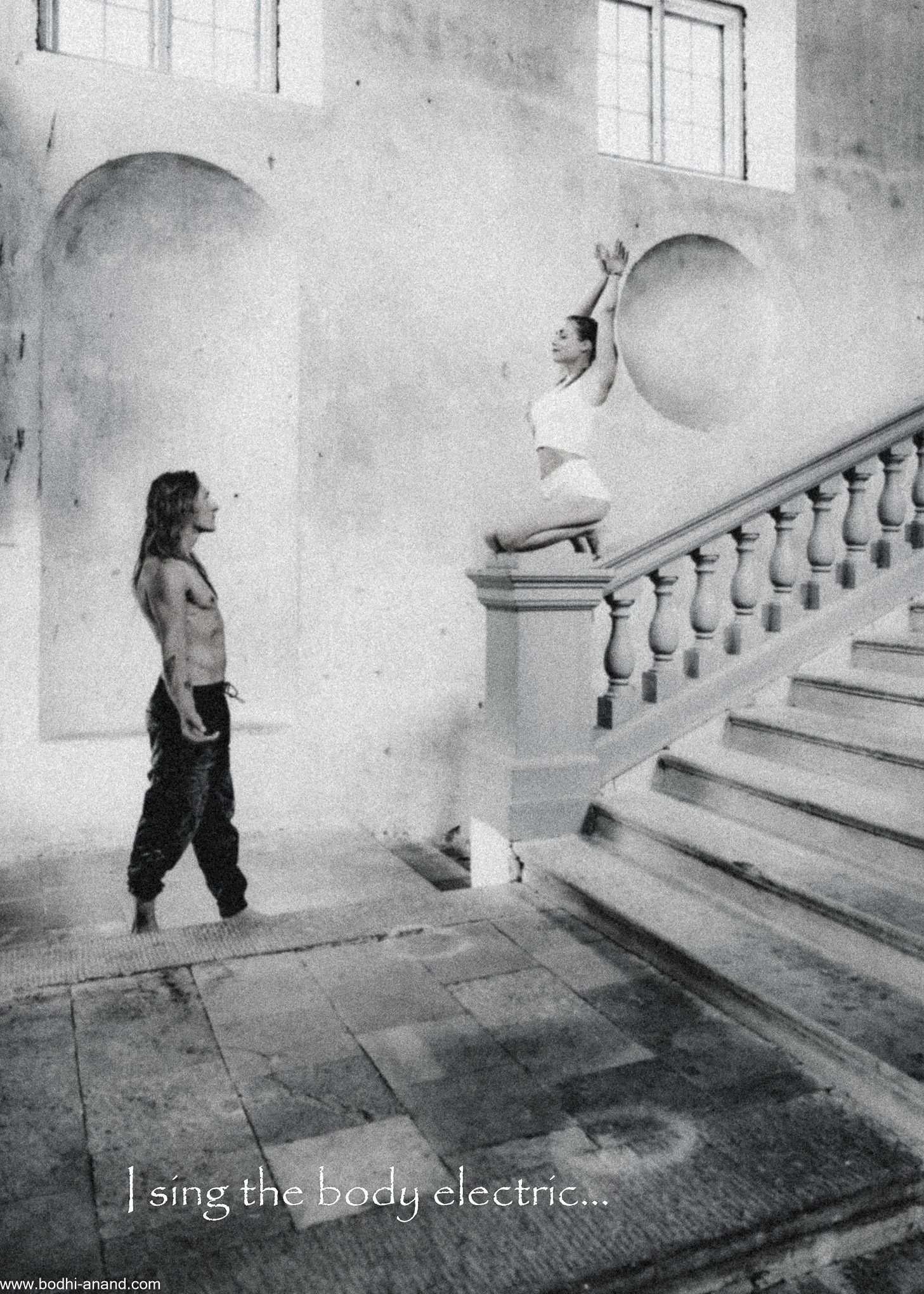 Fine art photograph of a figure beside a stone staircase.