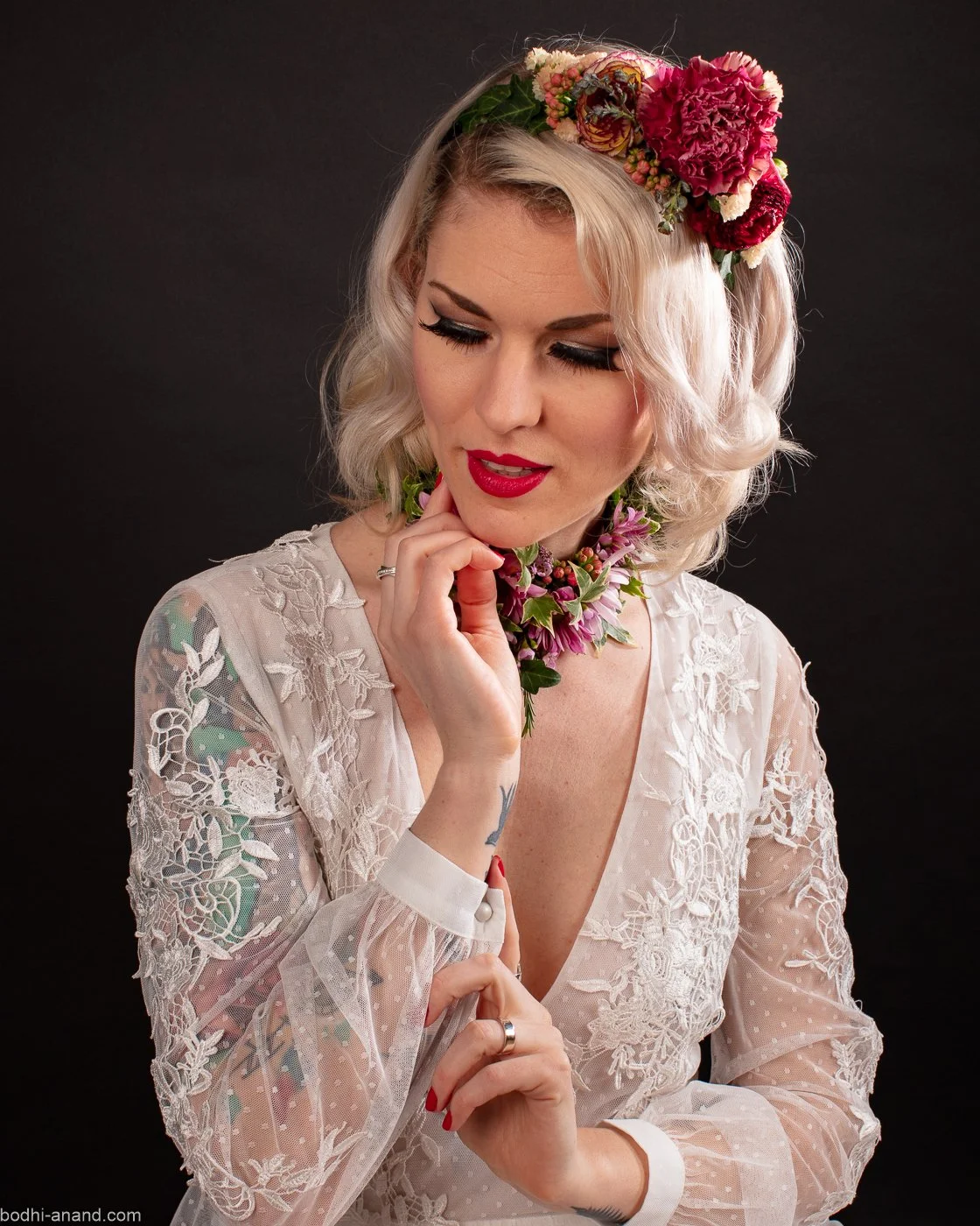 Portrait of a woman with flowers in her hair.