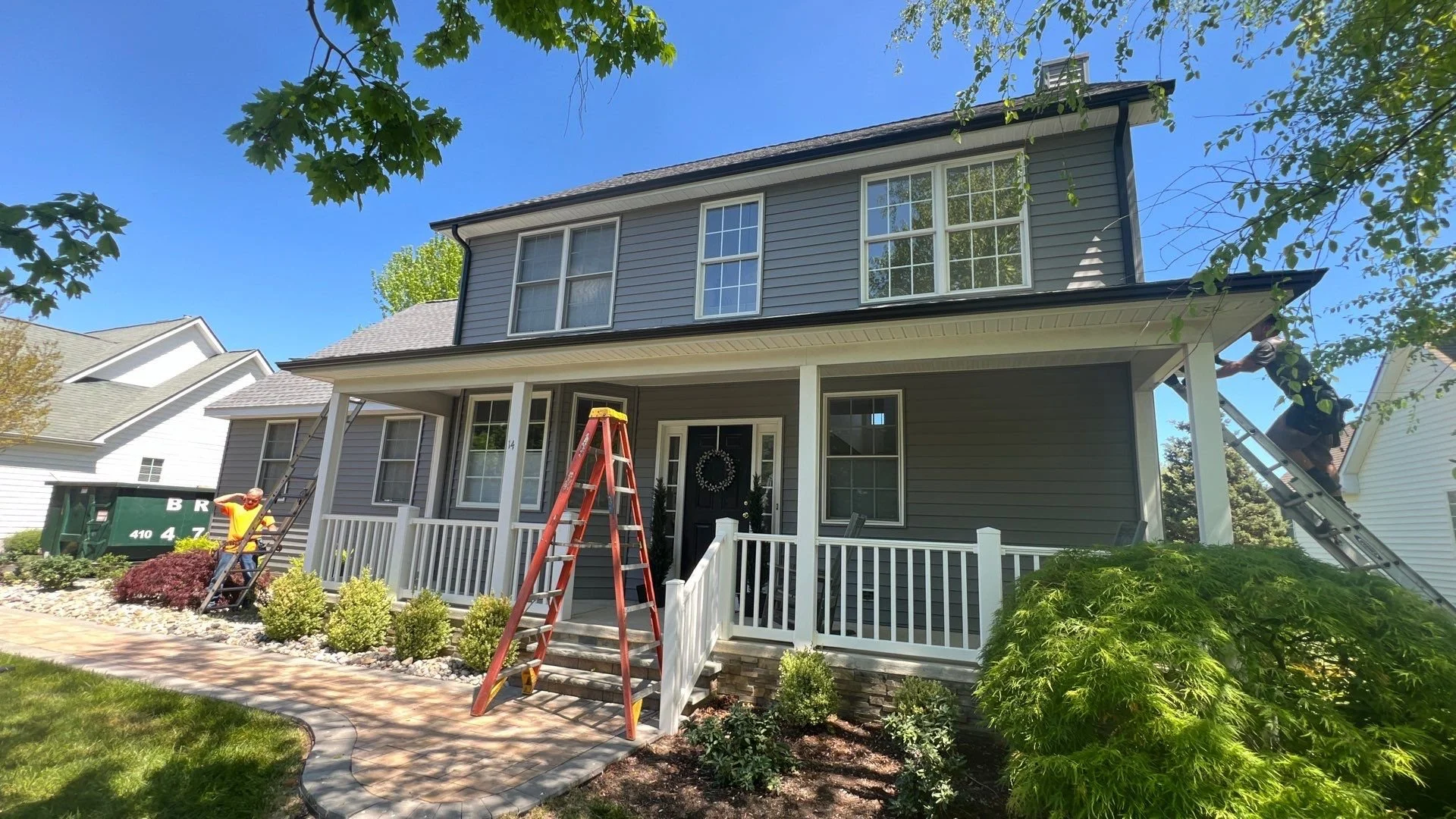 New siding deserves some new black aluminum gutters.
