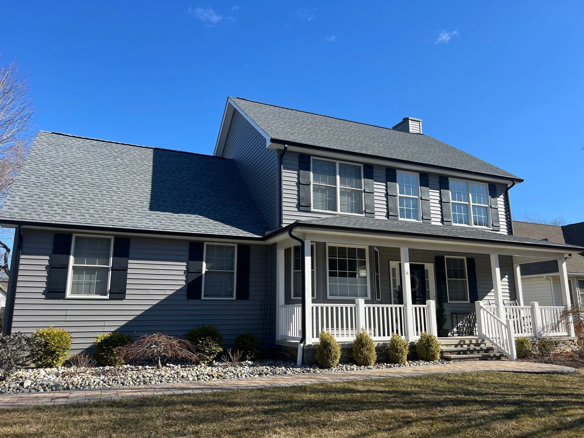 After photo of two story house in rehoboth beach delaware depicting siding replacement by Pro Exteriors