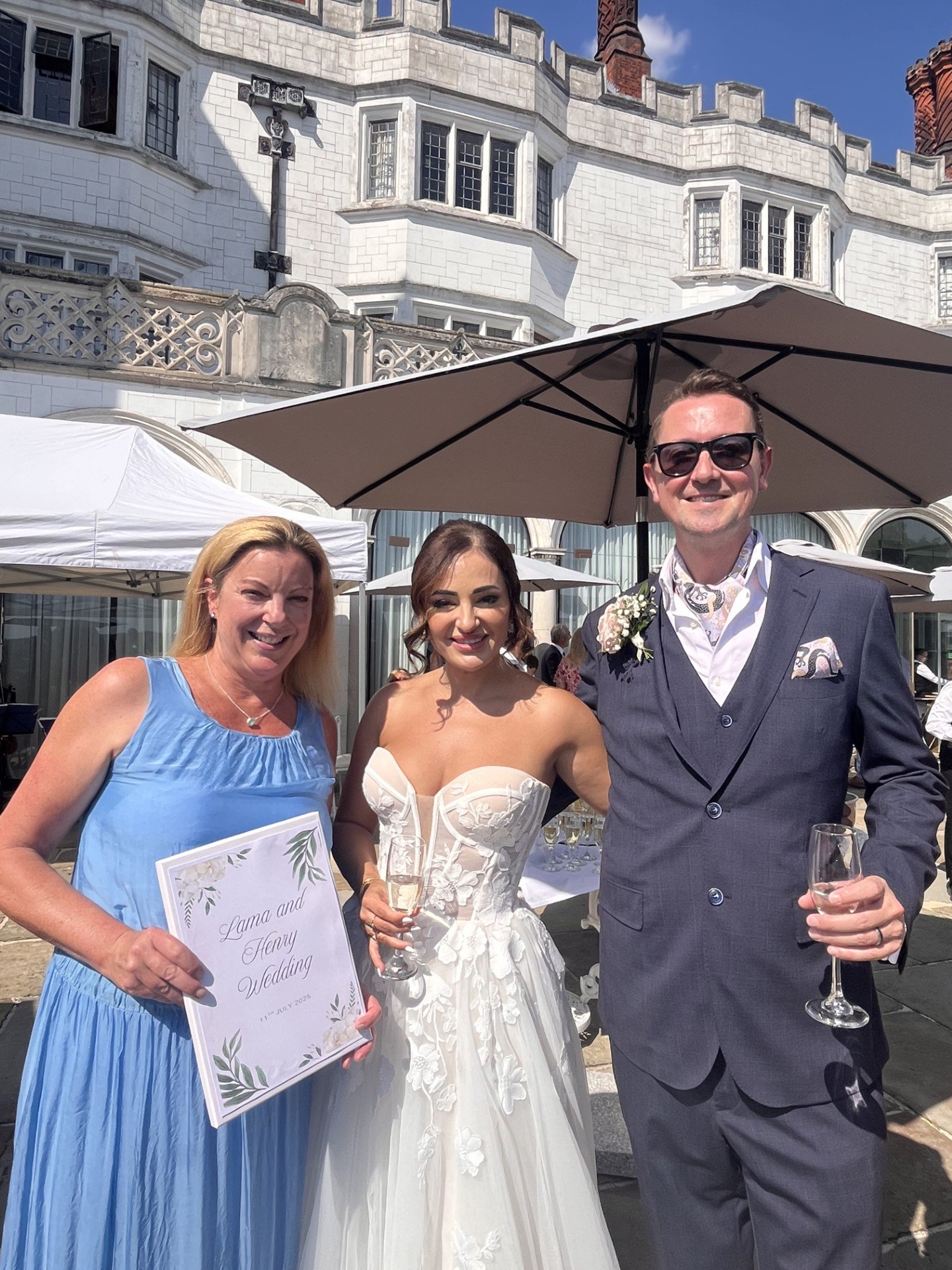 Happy couple exchanging vows during a bespoke wedding ceremony at Danesfield House