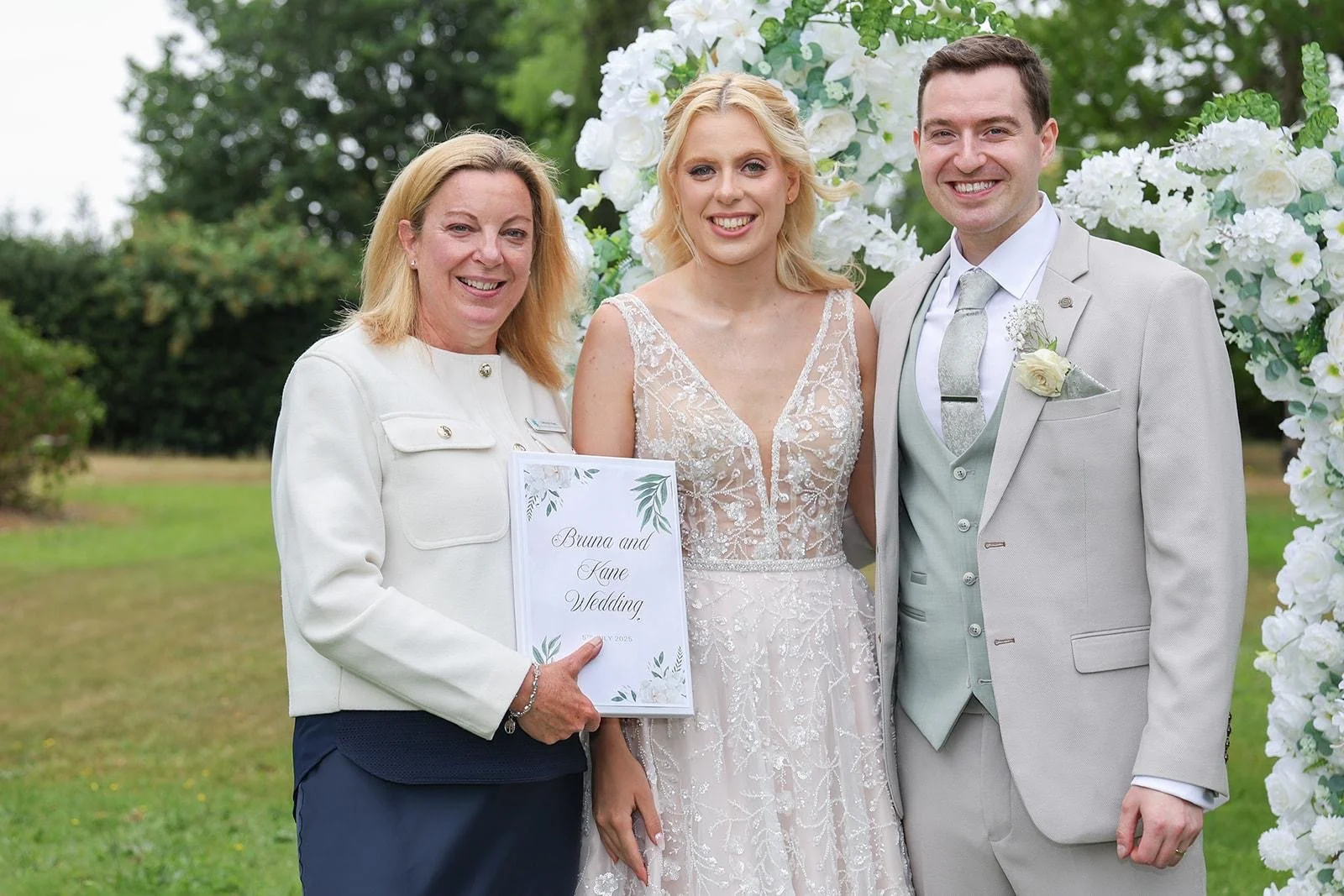 Bride and groom celebrating after their personalised wedding ceremony at Denham Mount Hotel