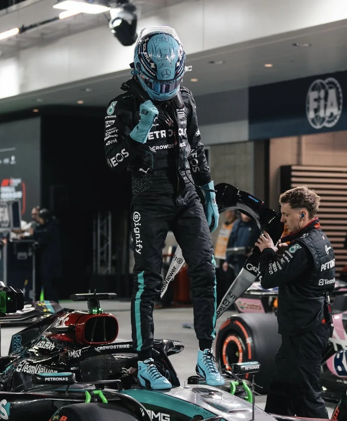 George Russell takes pole position