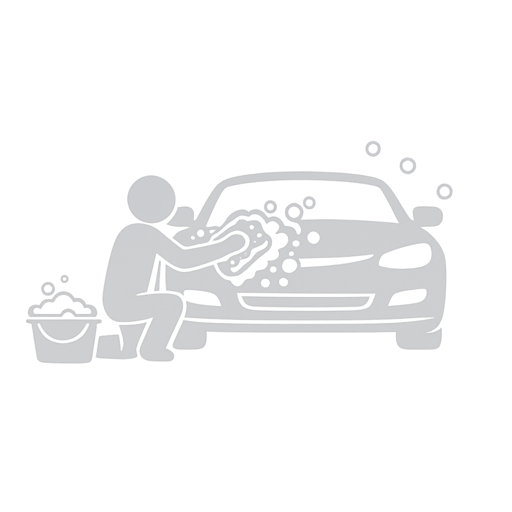 A person washing a car with a sponge, soap bubbles, and a bucket nearby.