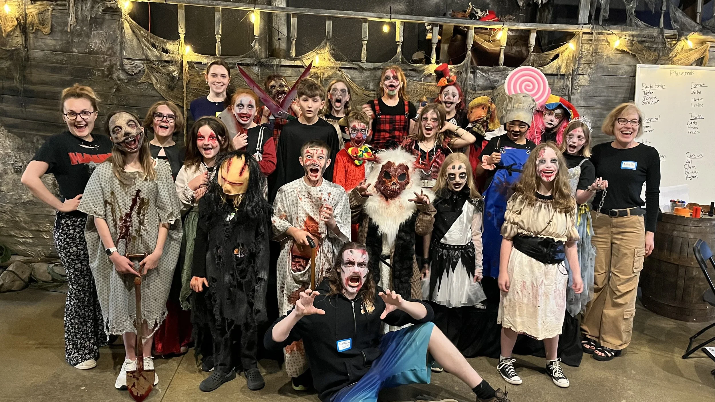 Group of kids dressed up in costumes for Camp Nowhere haunted house camp