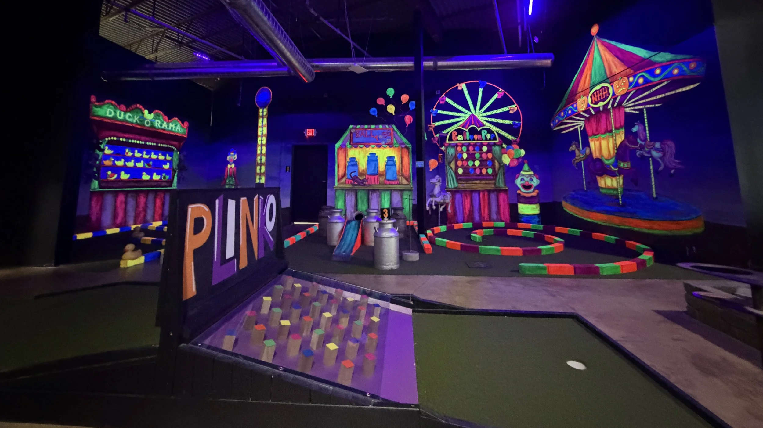 Image showing colorful lights and signs for a mini golf course in Inver Grove Heights