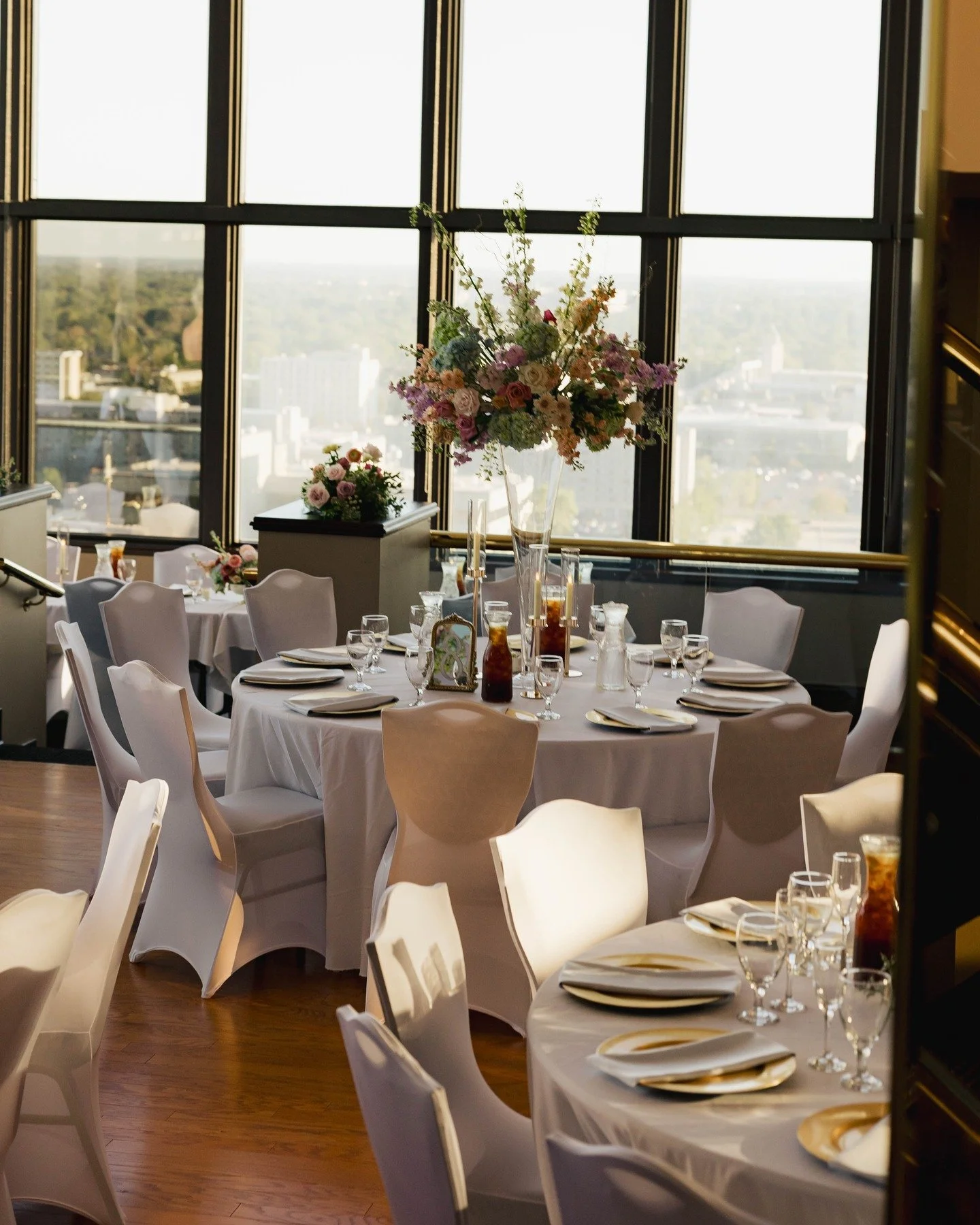 Tower Club is so back, baby. We had the BEST time decking out this historic venue on the top floor of the tallest building Springfield has to offer. Give us all the brass and all the 80s touches, and we'll give you a beautiful wedding celebration upd