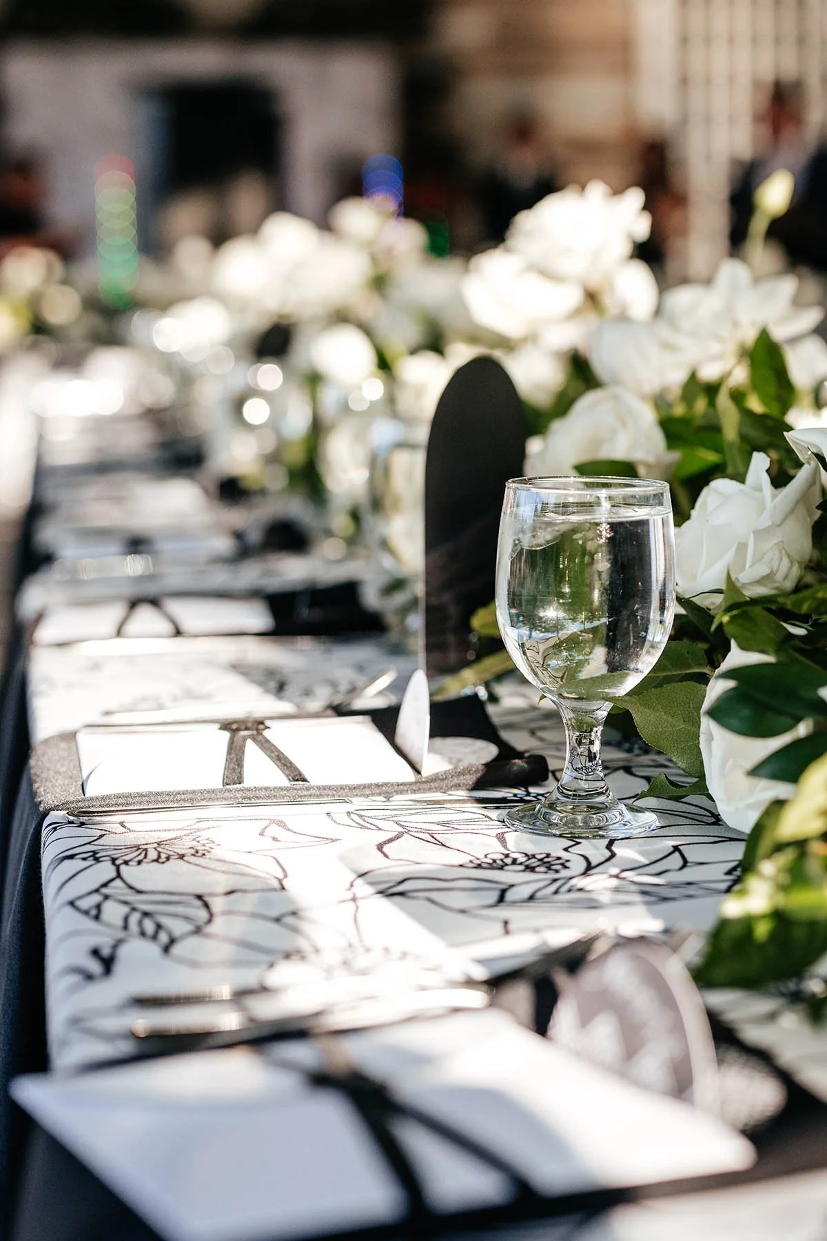 paper-goods-detail-photo-on-tables-florals-in-background.JPG