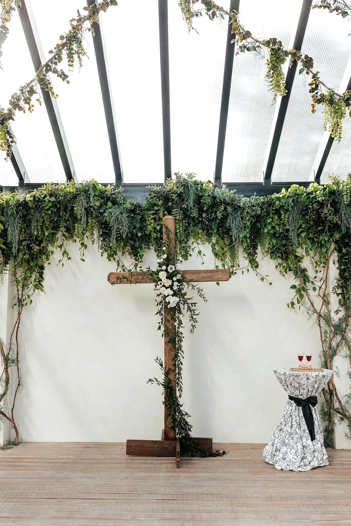 greenhouse-two-rivers-ceremony-cross-florals.JPG