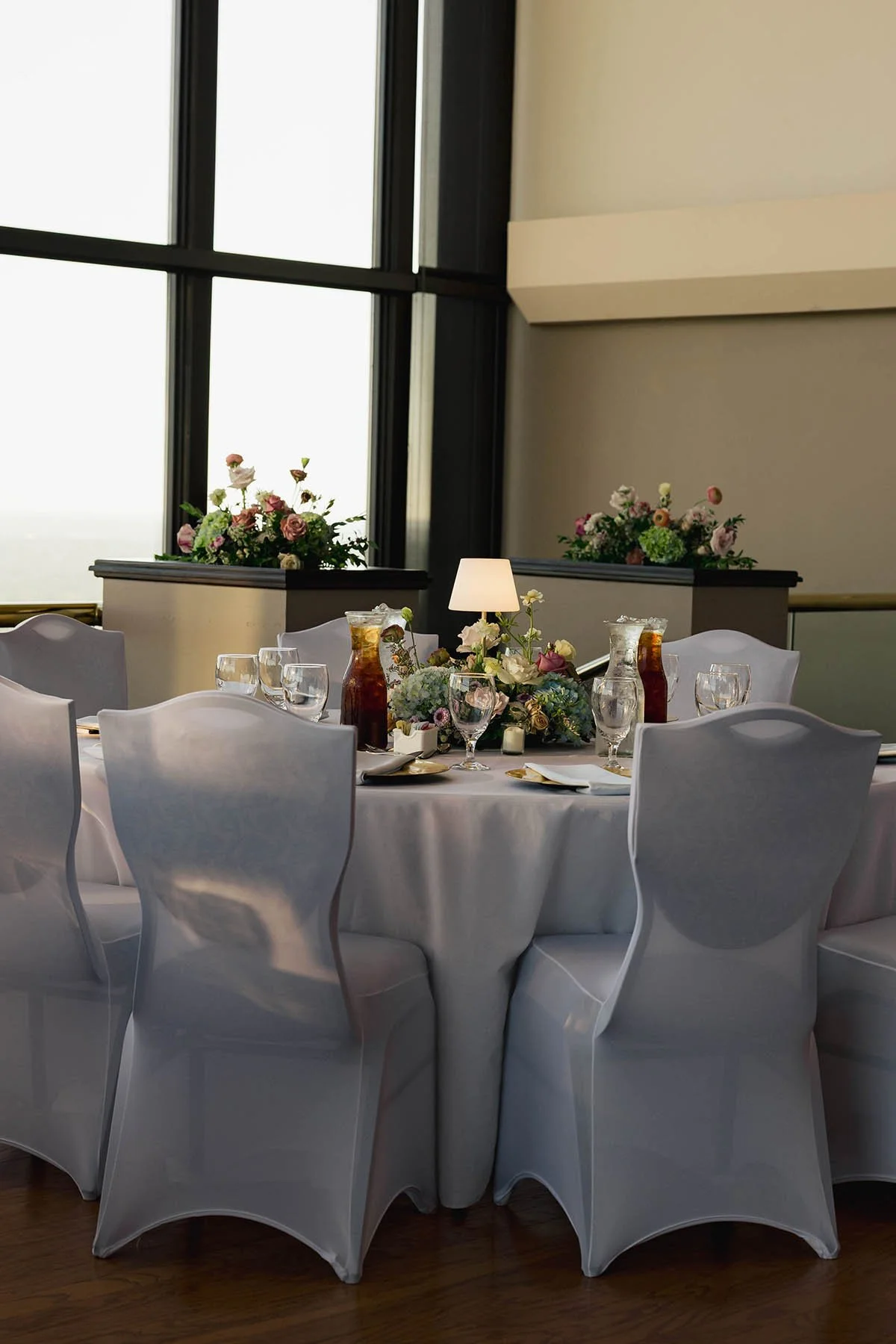 lamp-guest-table-centerpiece-with florals-in-background.JPG