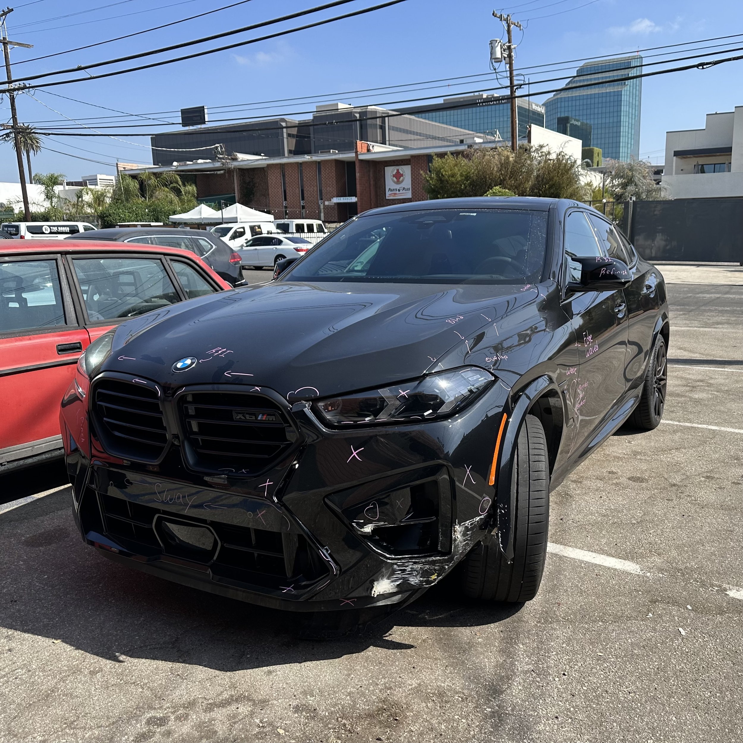 Oranssi technician working on a roof project