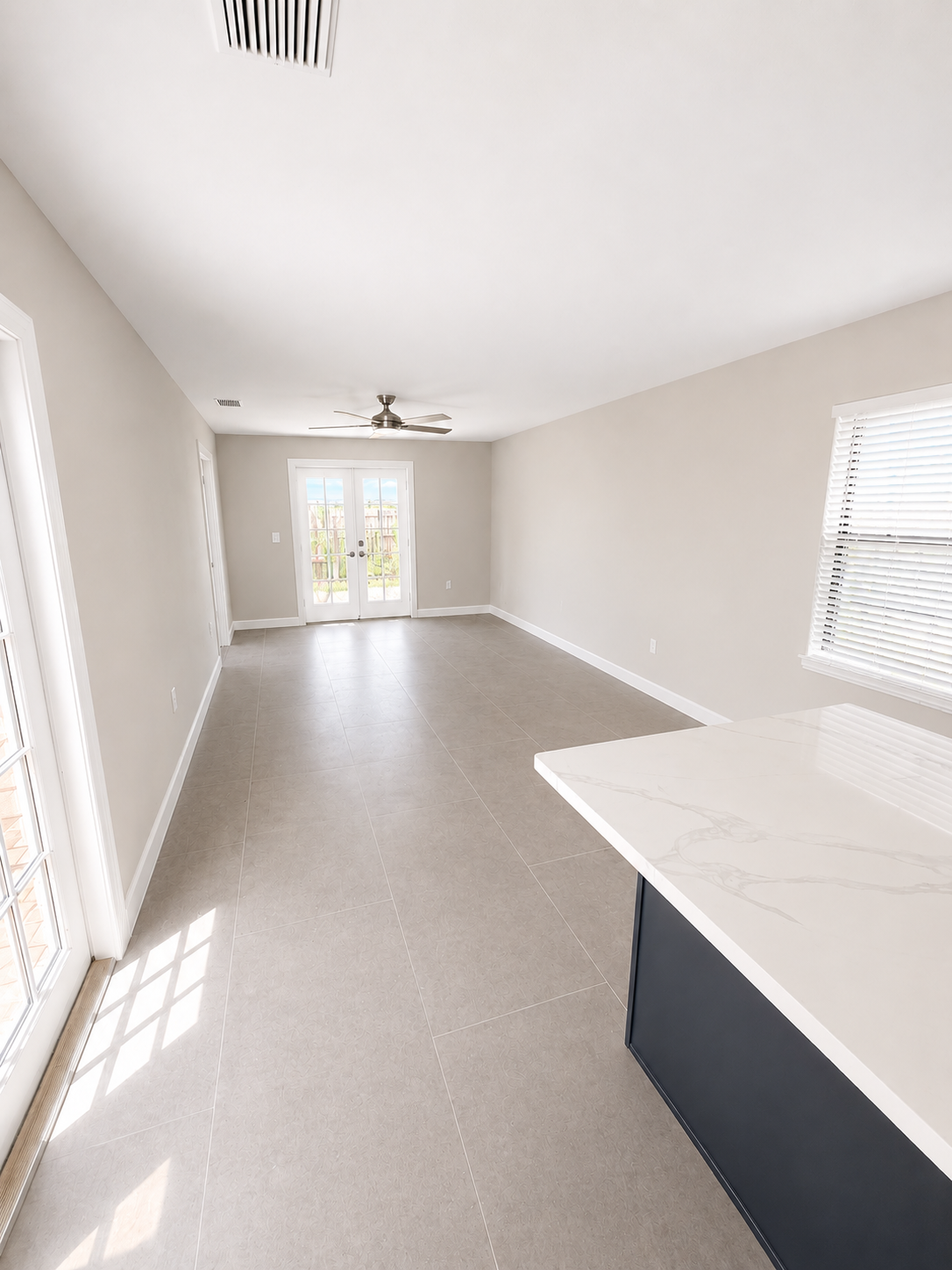 Great room with plenty of natural light.