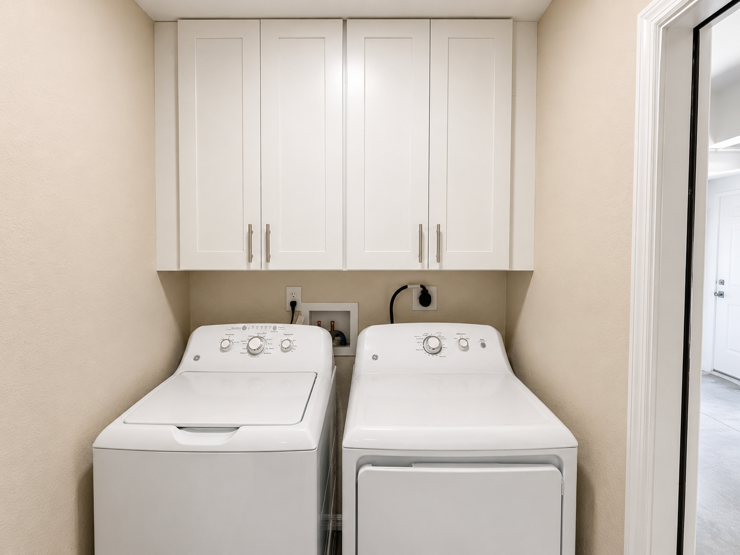 Laundry room with washer and dryer included 